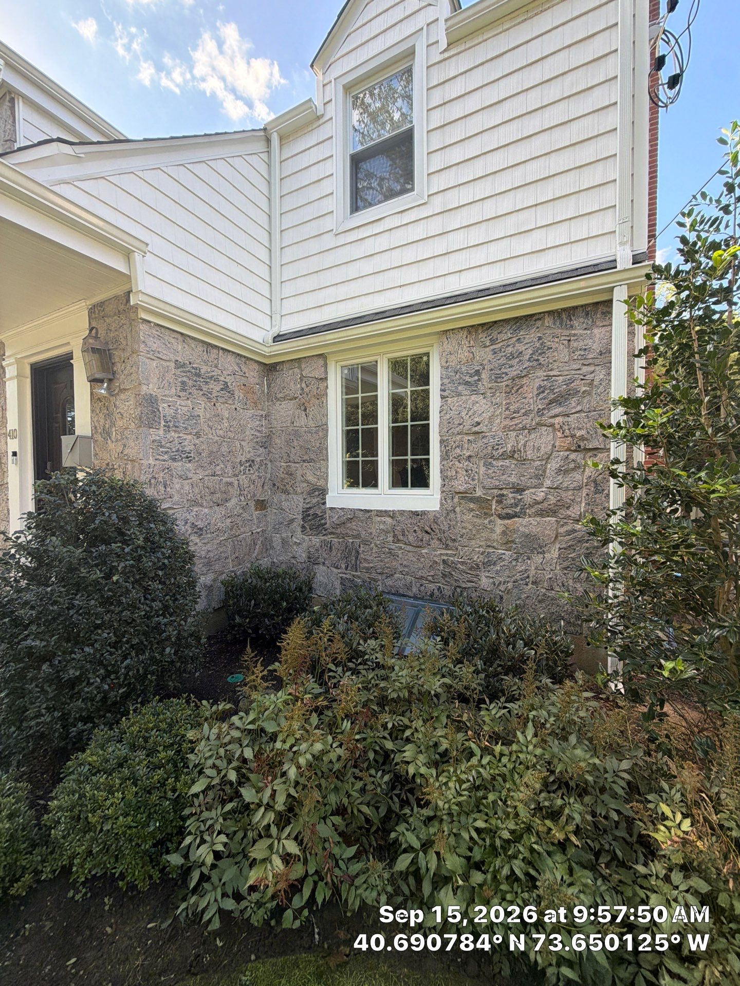 White Seamless Gutter and Downspout Replacement in West Hempstead by Above All Gutters