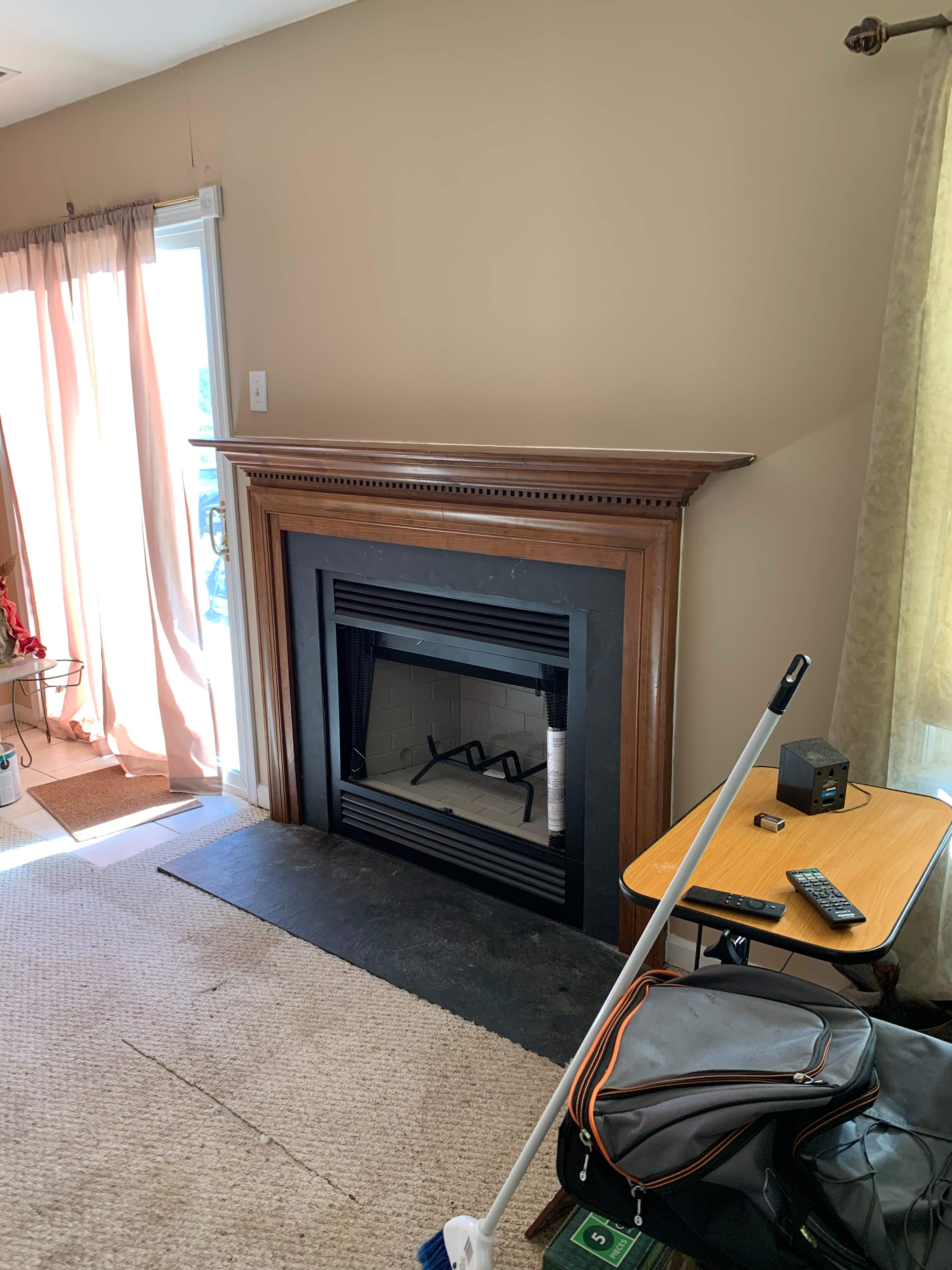 Wood Fireplace + Slate + Mantel by Premier Chimney and Roofing