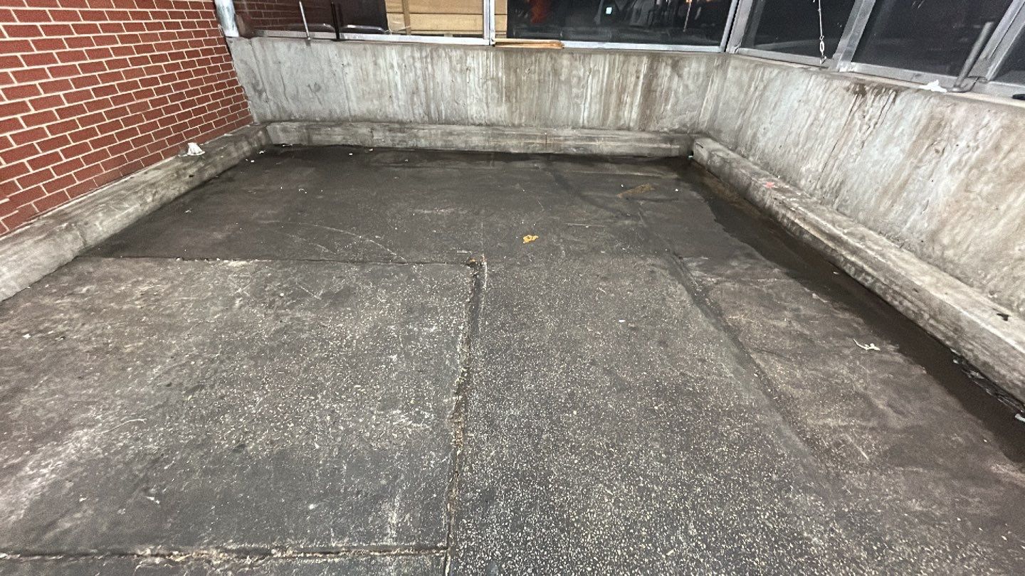 Concrete sidewalk cleaning and degreasing by Northern Power Washing LLC.