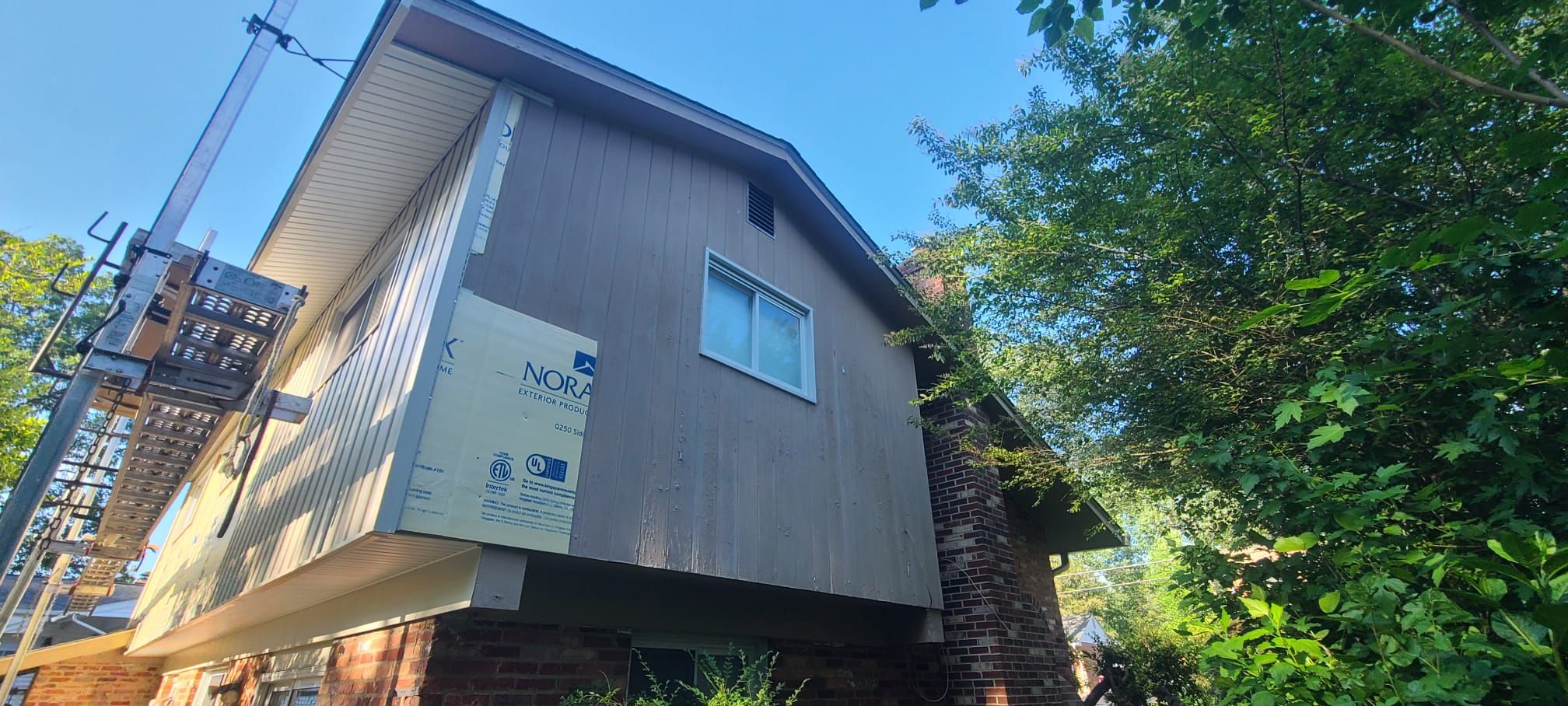 Fairfax: Residential Siding Replacement with CertainTeed 8" Board and Batten Siding in Desert Tan by RM Banning, Inc.