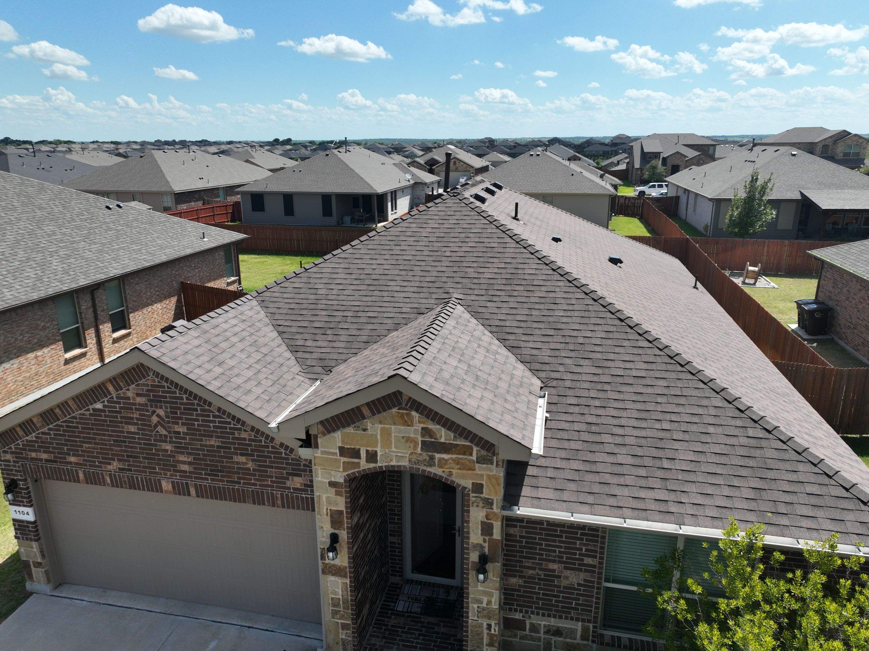 Residential Roofing Installation using IKO Cambridge Dual Brown by OneSource Roofing and Restoration
