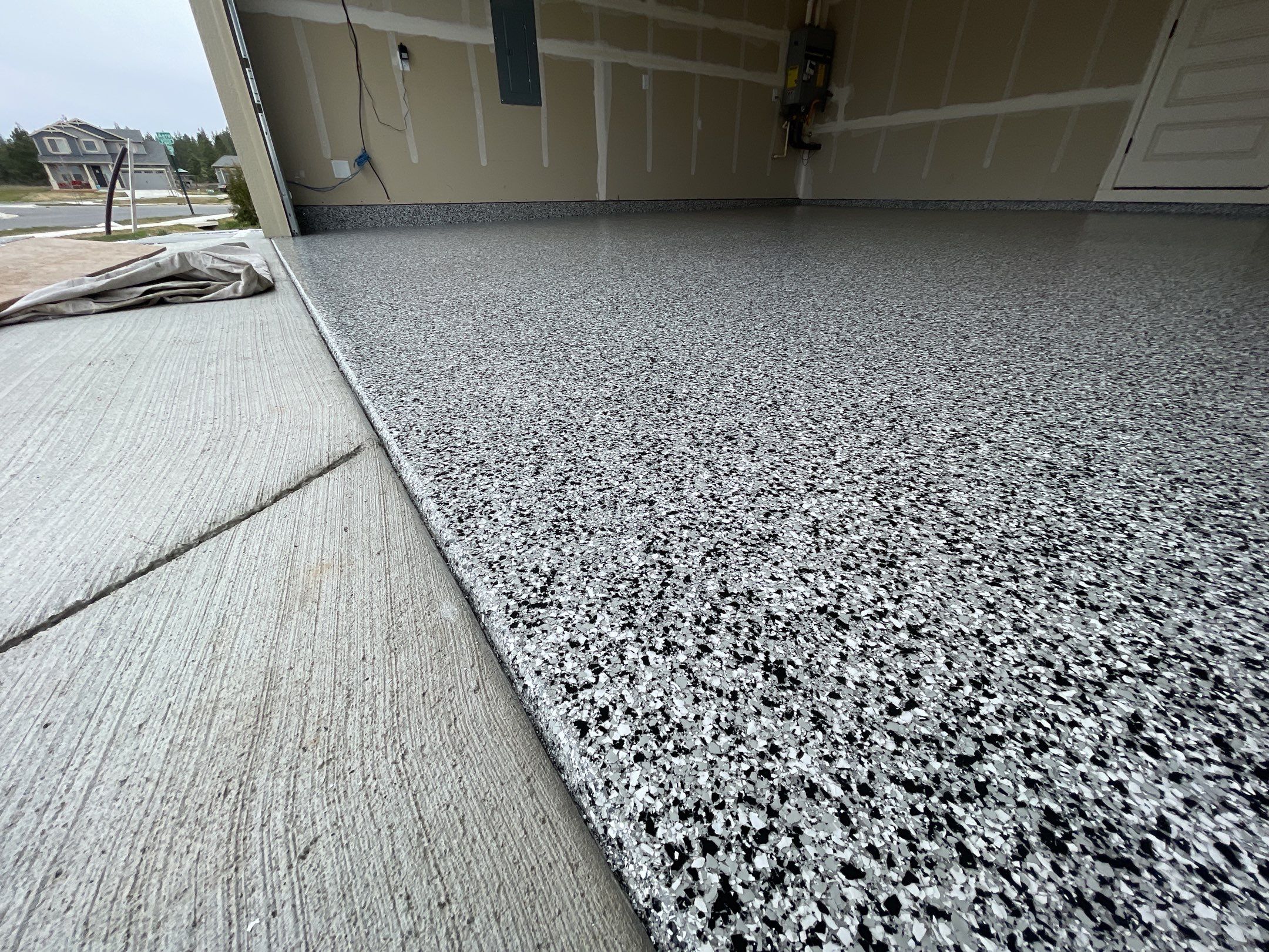 Garage Transformation using Domino by Croc Coatings, LLC