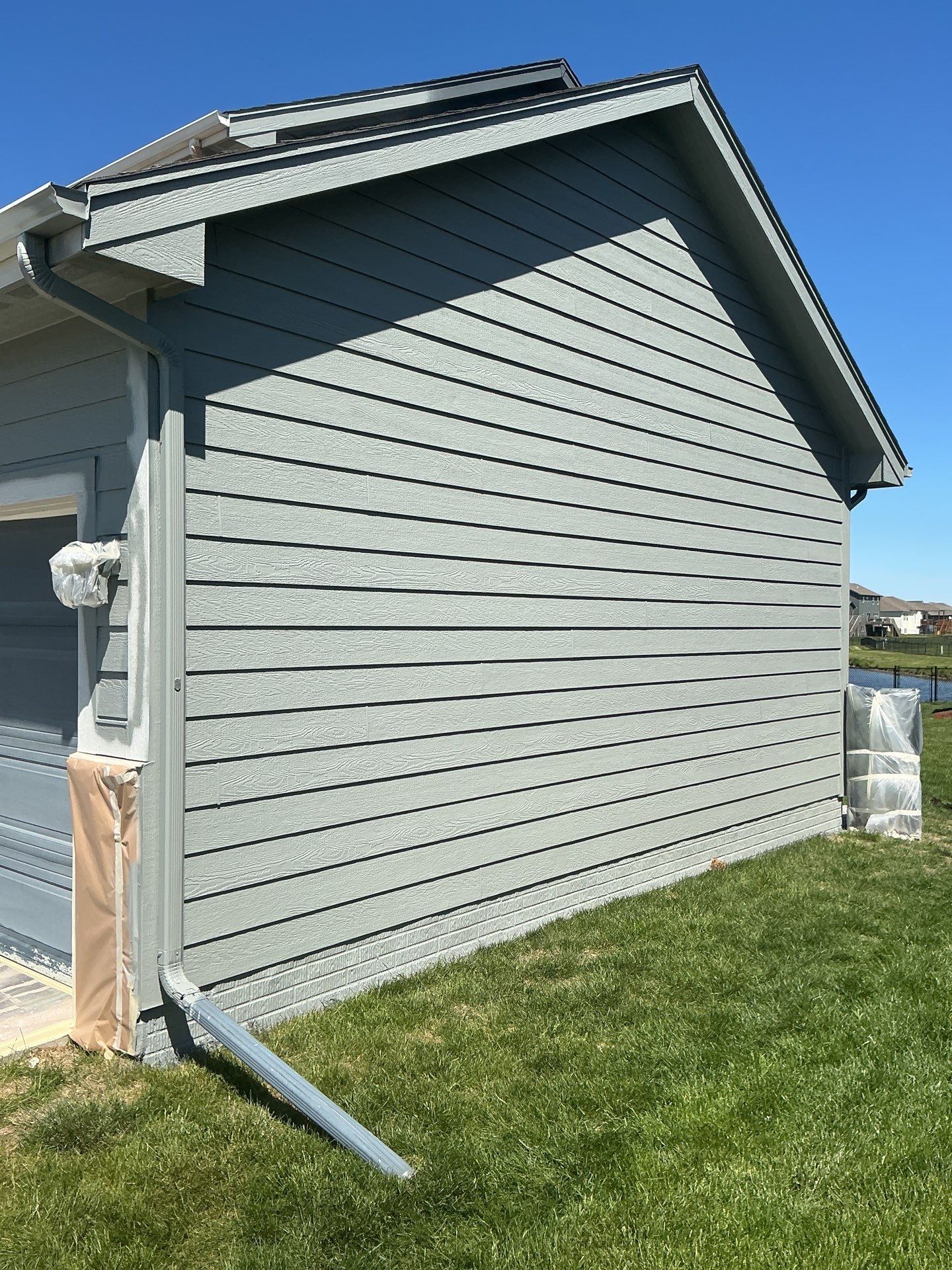 Residential Exterior Repaint in Ankeny by Midwest Paint LLC