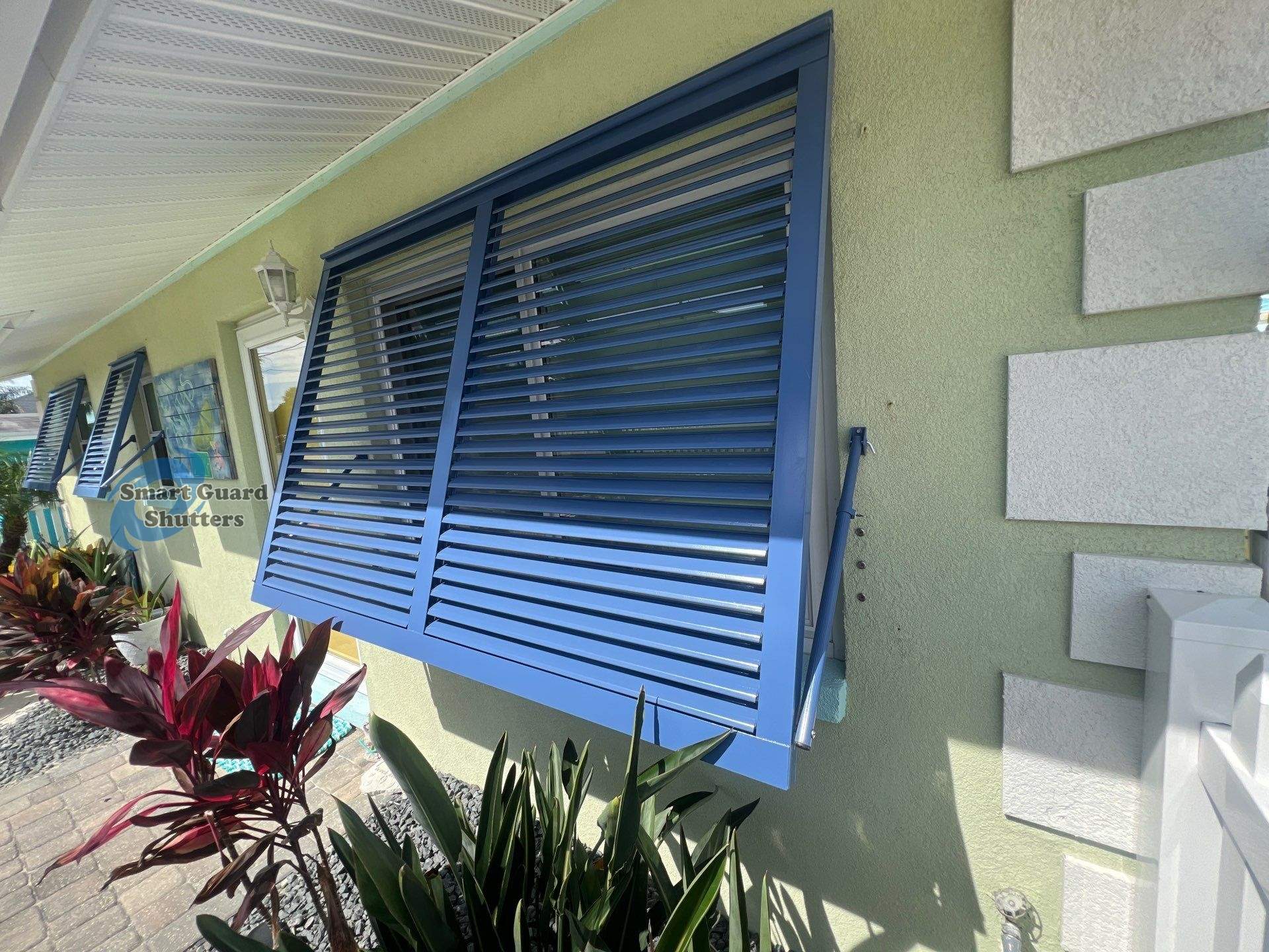Impact Bahamas in Distant Blue by Smart Guard Shutters
