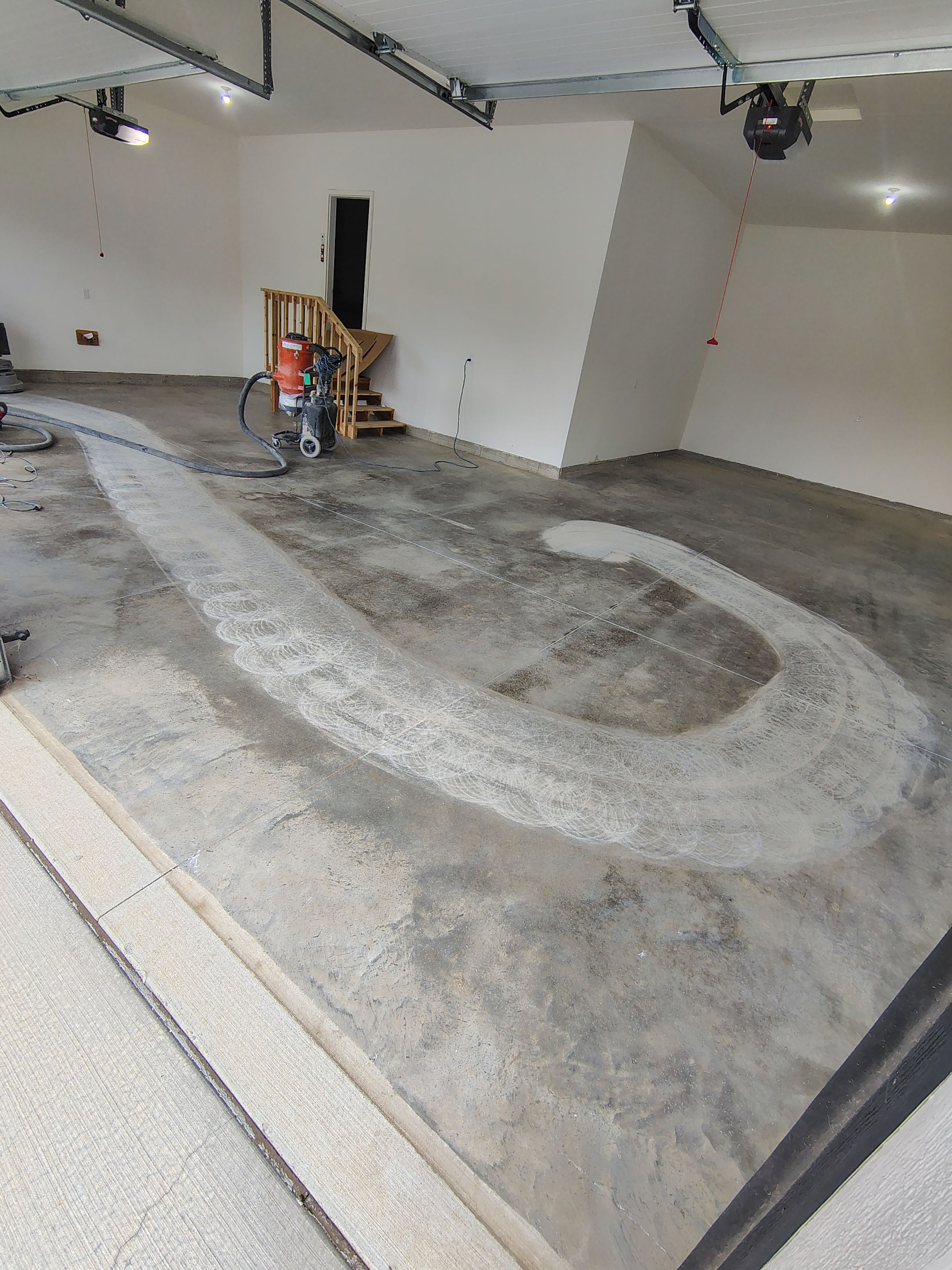 Sioux Falls Garage Floor Transformation with Gray Decorative Flake Coating by Select Painting, Coatings & Garage Cabinets