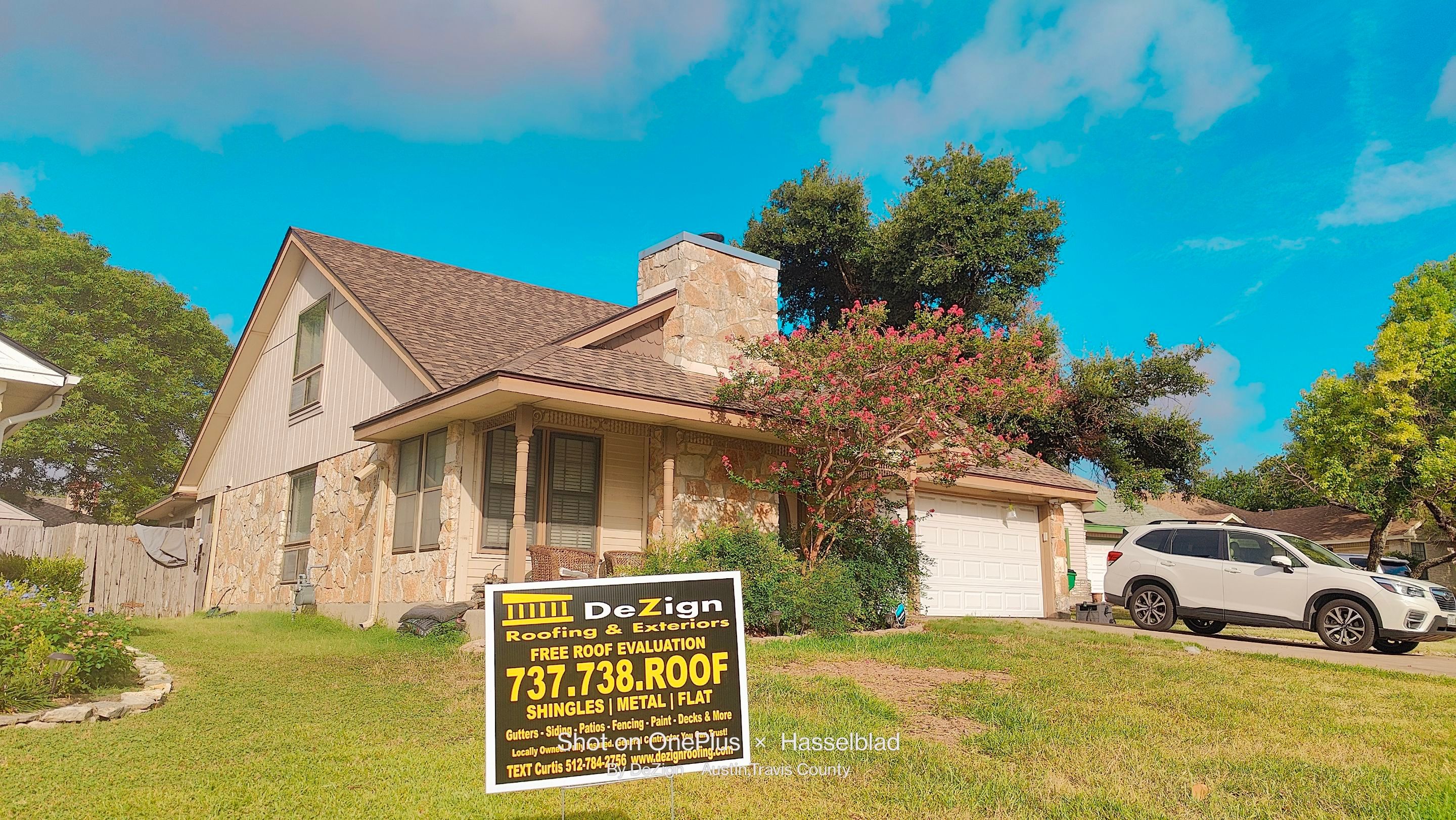 New Roof Installation Of IKO Dynasty Color Brownstone by DeZign Roofing & Exteriors