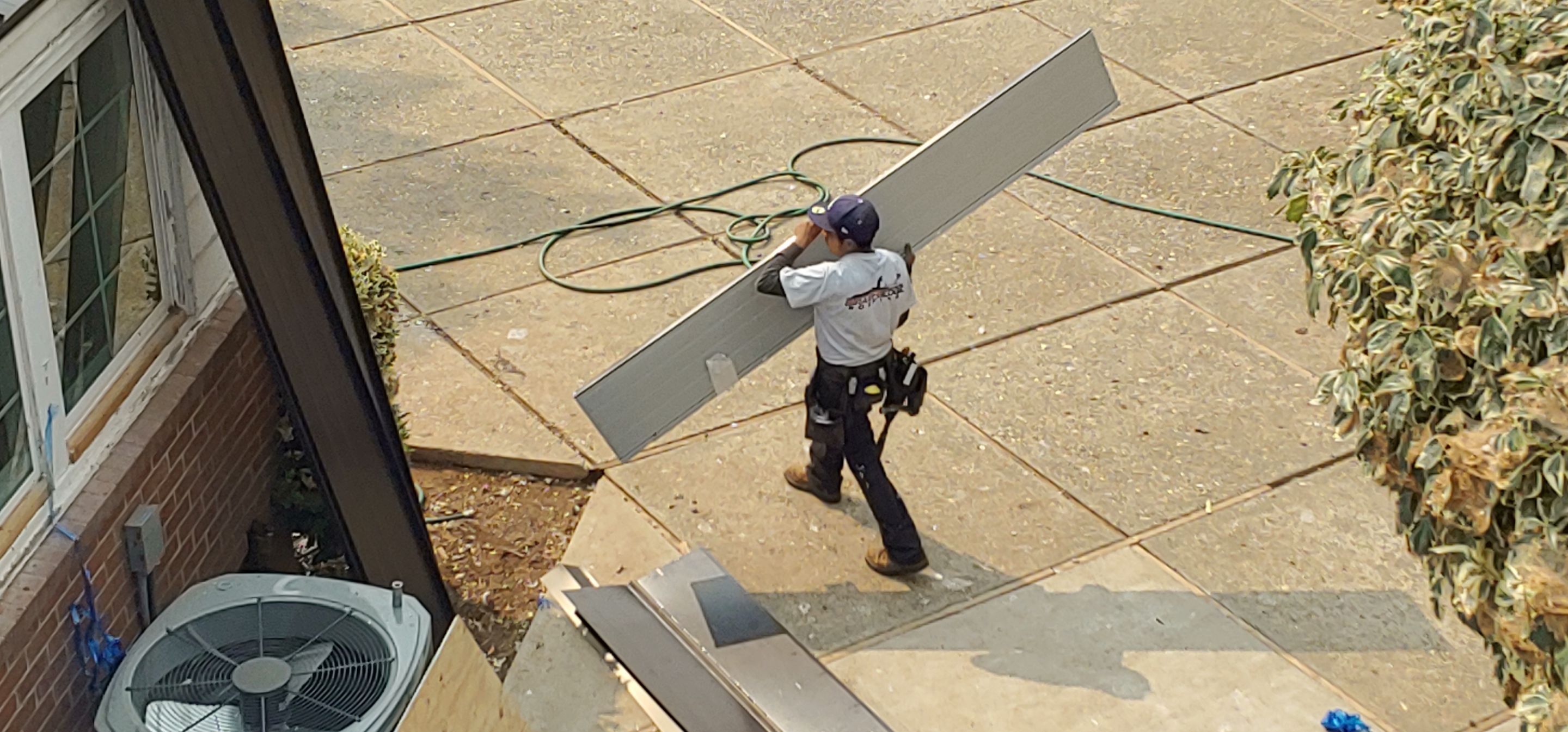 Residential Roofing Installation using Standing seam metal roofing system by Straight Edge Roofing Inc