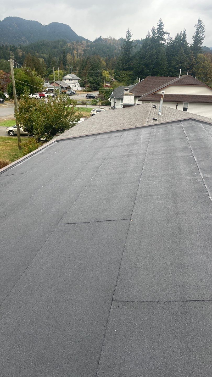 Residential ReRoofing Installation using IKO 2ply sbs  by Top Notch Roofing Inc