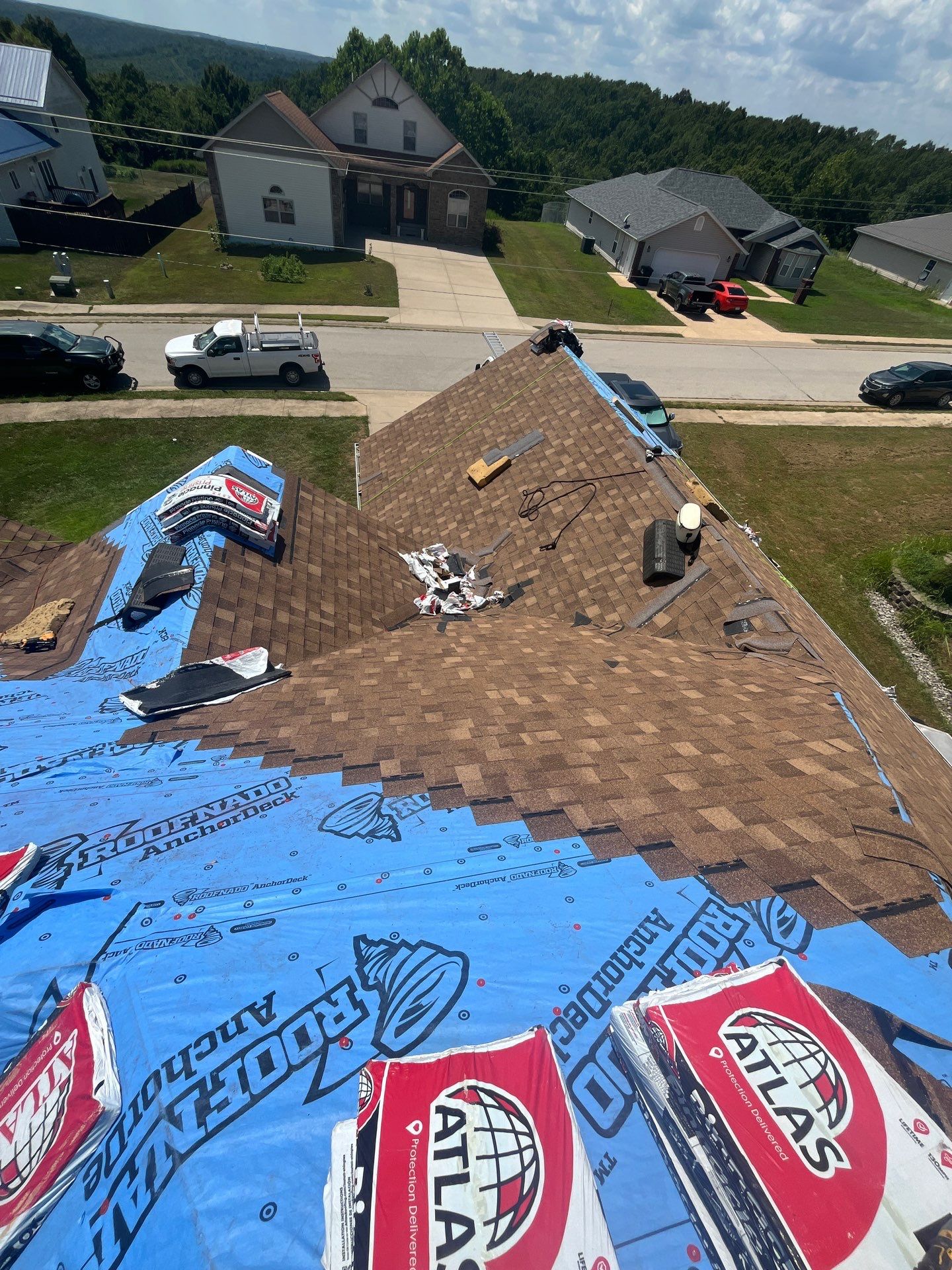 Residential Roofing & Gutters + Downspouts Install  by Titan Commercial & Residential Roofing 