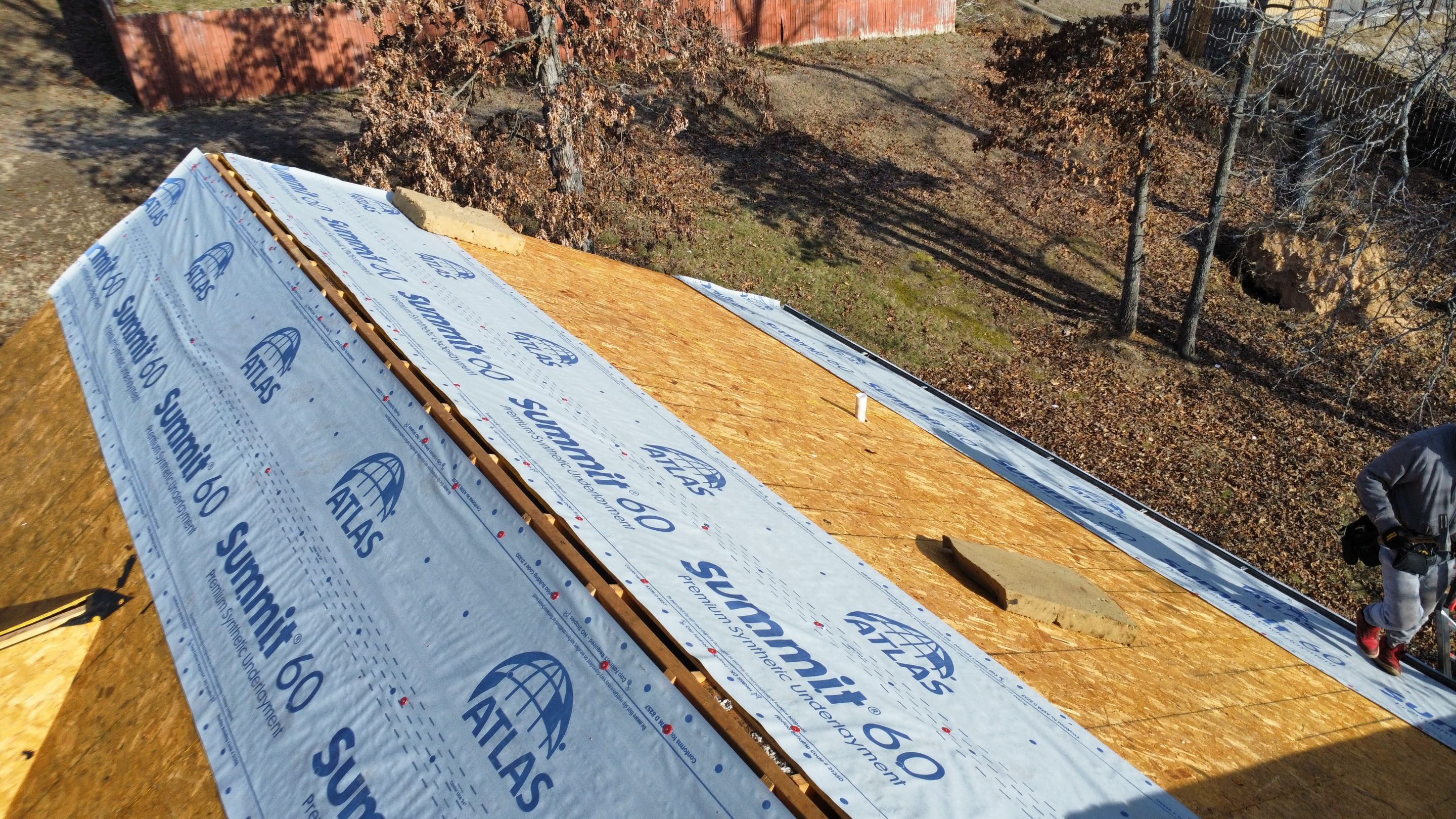 Residential Roof + Gutters & Downspouts Install  by Titan Commercial & Residential Roofing 