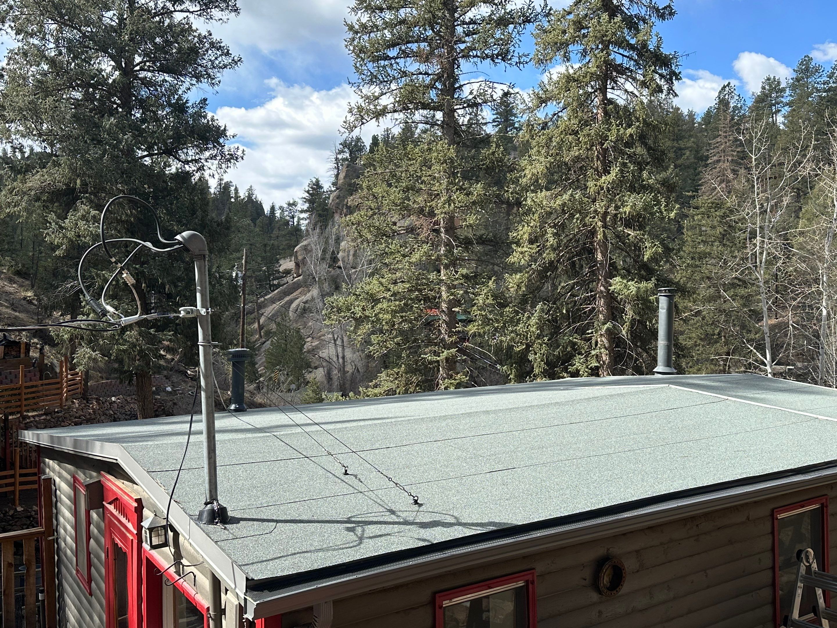 Residential Roofing Installation using Modified Bitumen Roofing by Blue Peaks Roofing LLC 