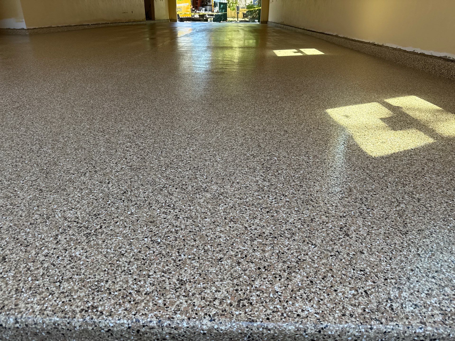 Garage and interior Project in Gainesville, FL in Sandstone by Cross Creek Concrete Coatings