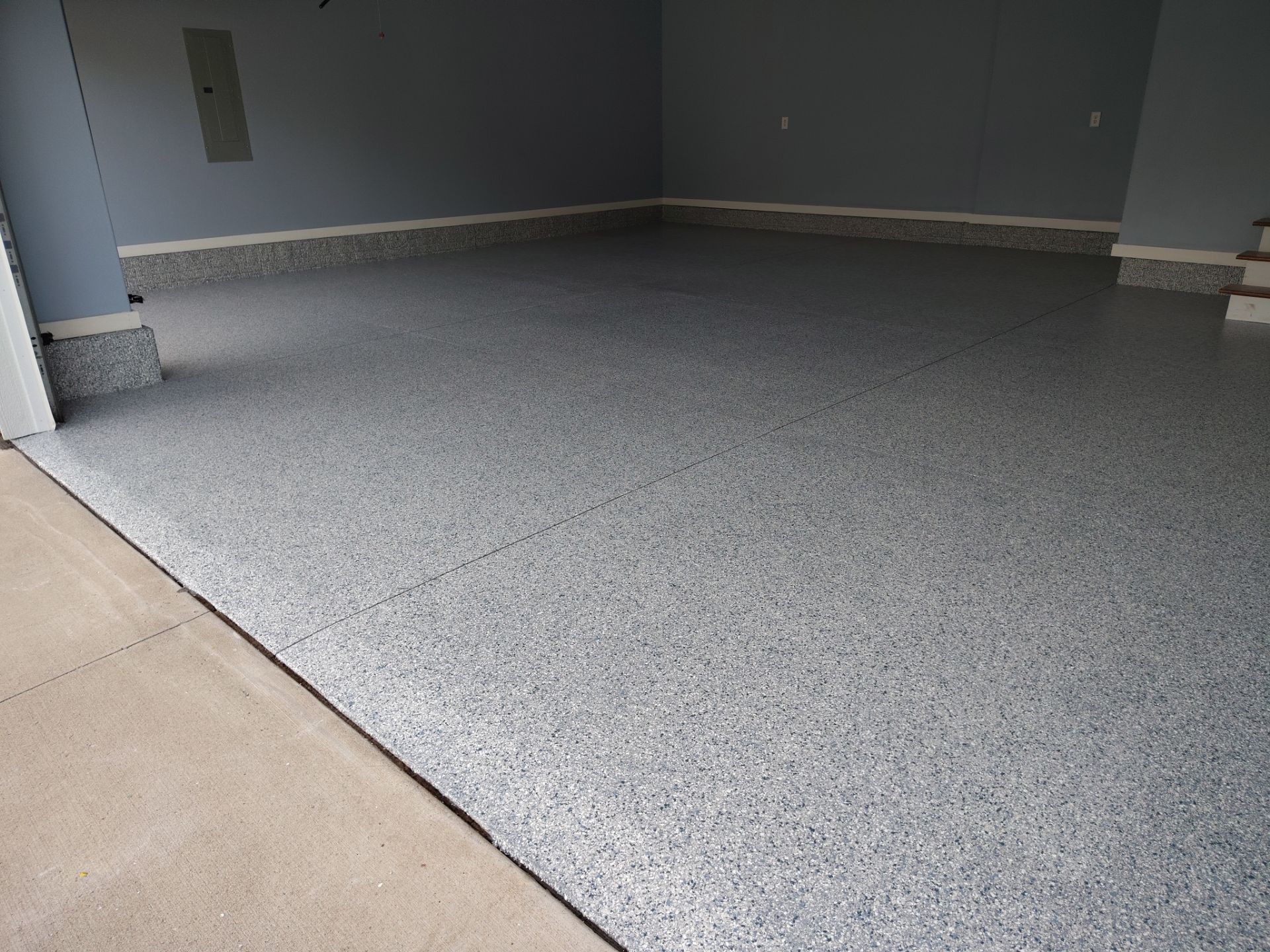 Tidal Wave Garage Transformation in Adel, Iowa by Revival Concrete Coatings