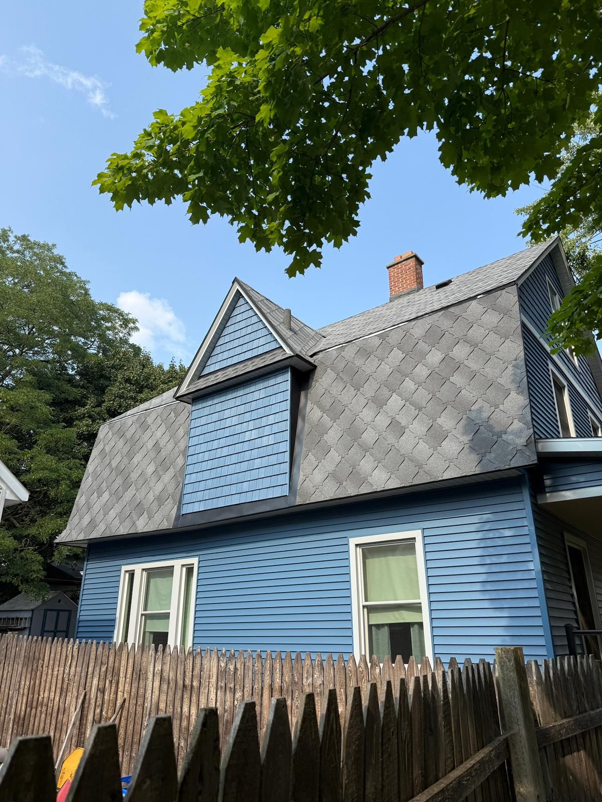 SIDING, DECK AND NEW PORCH  by Avalon Roofing and Exteriors