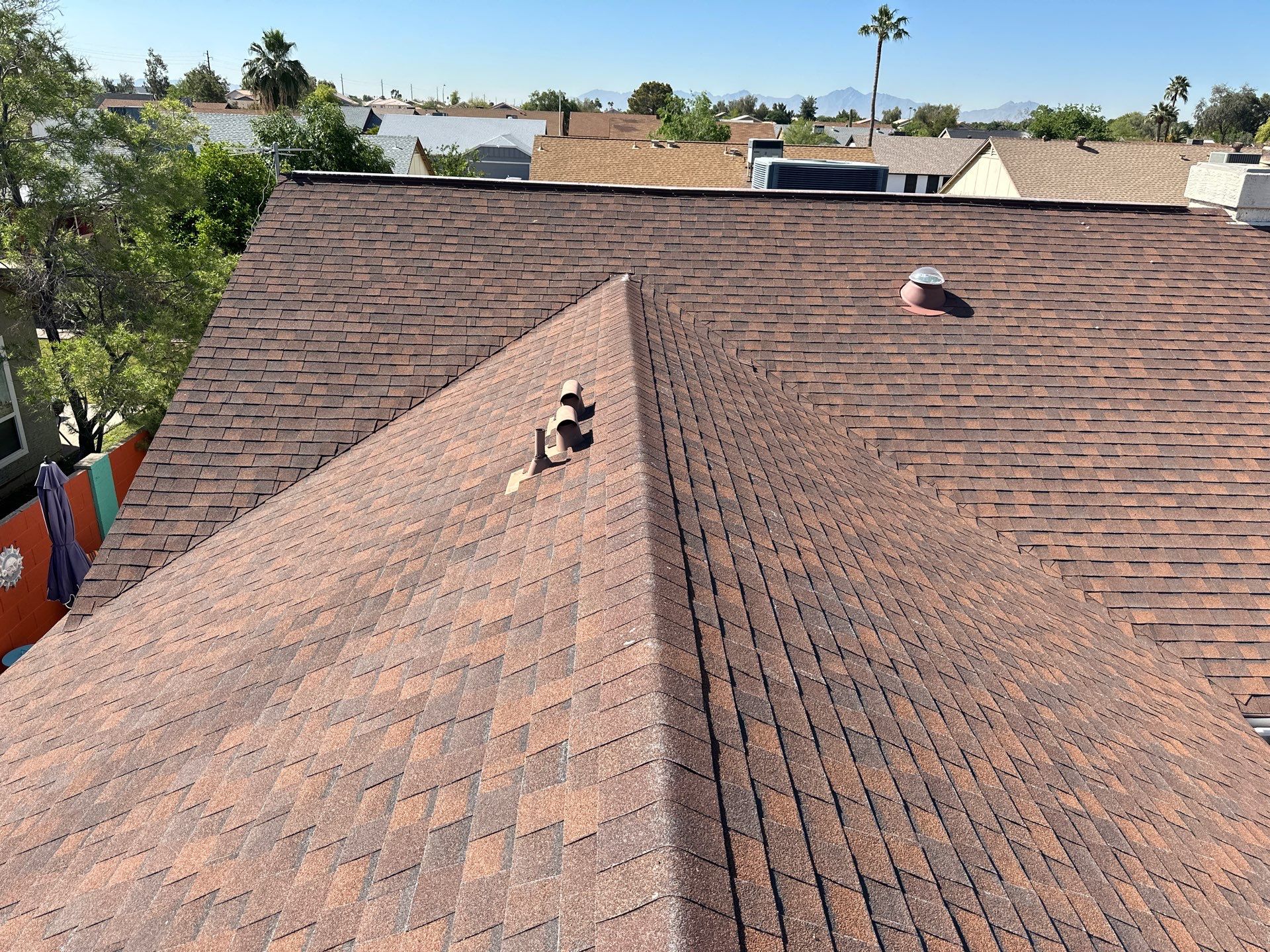 Terra Cotta Exposed Fastener by Reimagine Roofing