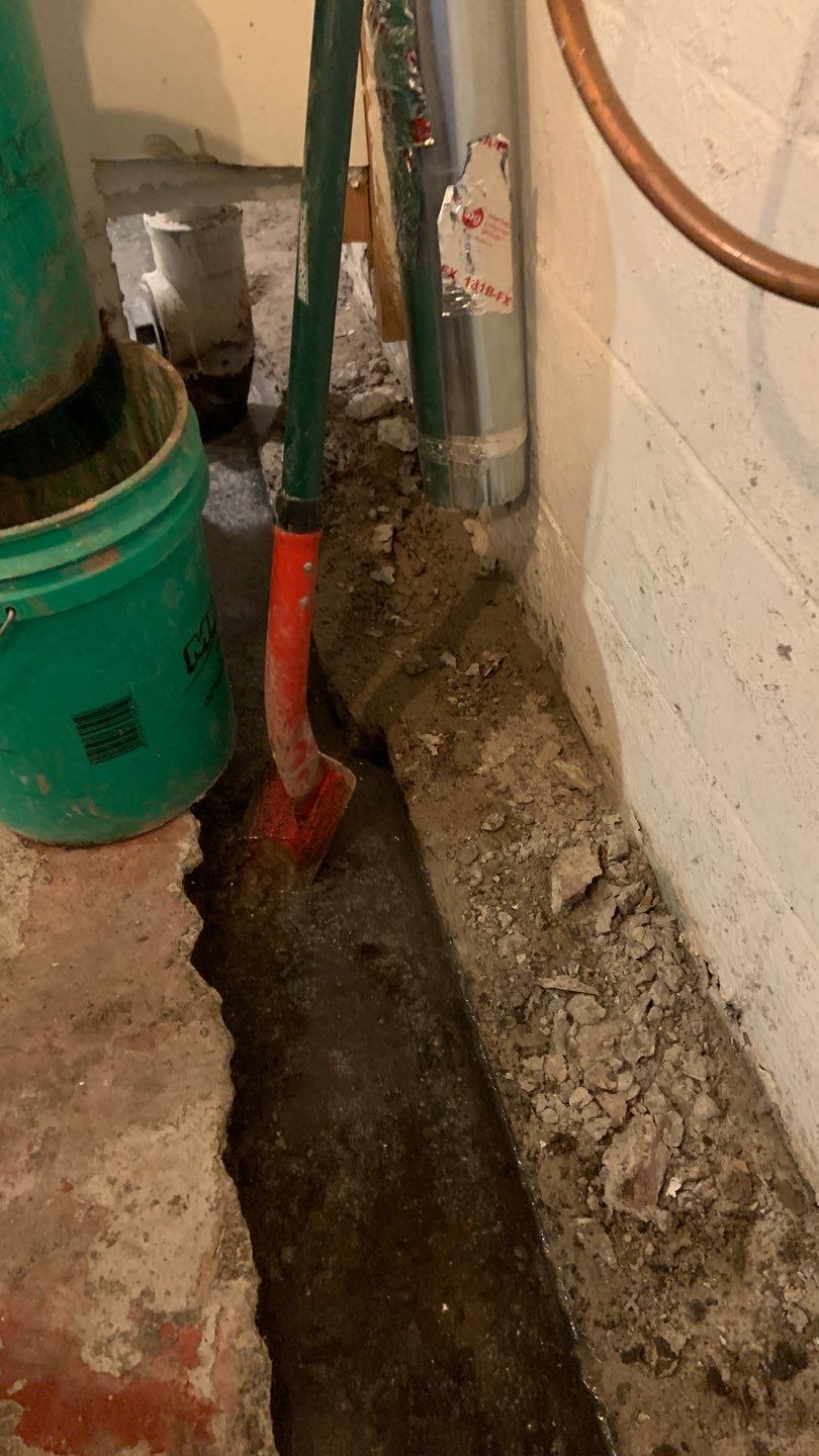 Solving a One-Wall Water Issue in St. Paul by Waterproofing Northeast
