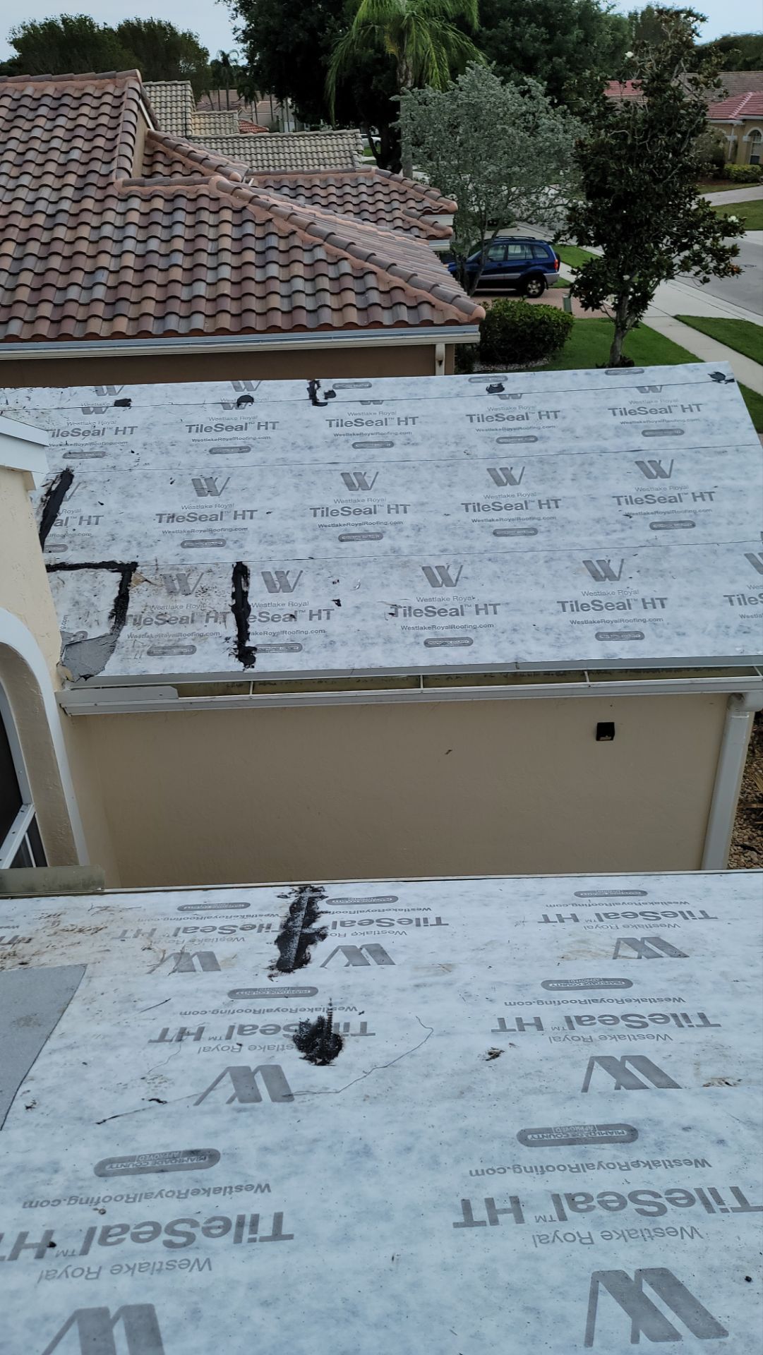New Barrel Tile Roof Installation and Decking Repair in Boynton Beach by Aastro Roofing