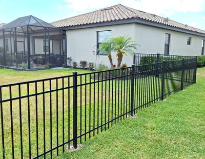 Aluminum Fence Installation using Black 3 Rail Aluminum Fence