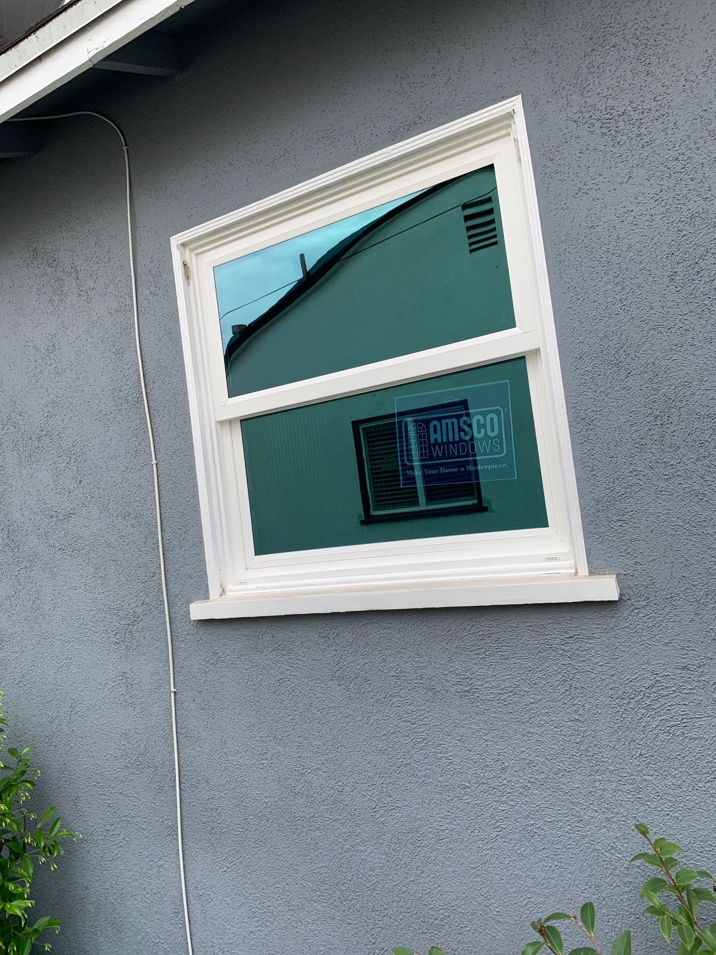 Patio door installation using Amsco Studio Series Vinyl by American Window Company