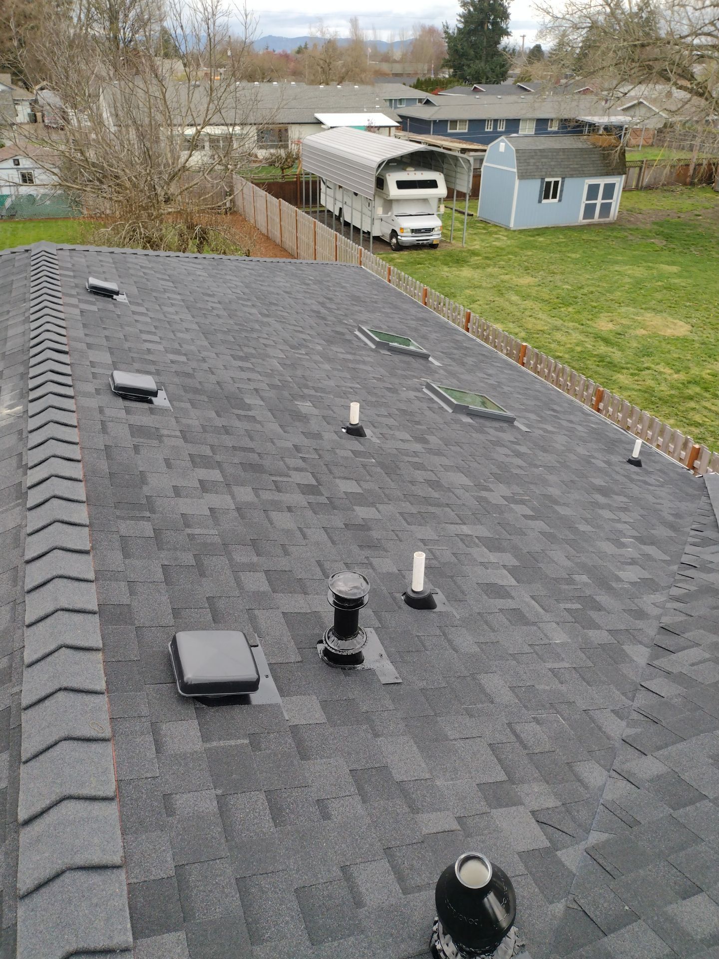 Residential Roofing Installation using IKO Dynasty (Color: Granite Black) by Orezona Building & Roofing Company, Inc.