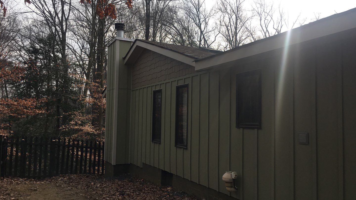 Siding Replacement by American Home Contractors
