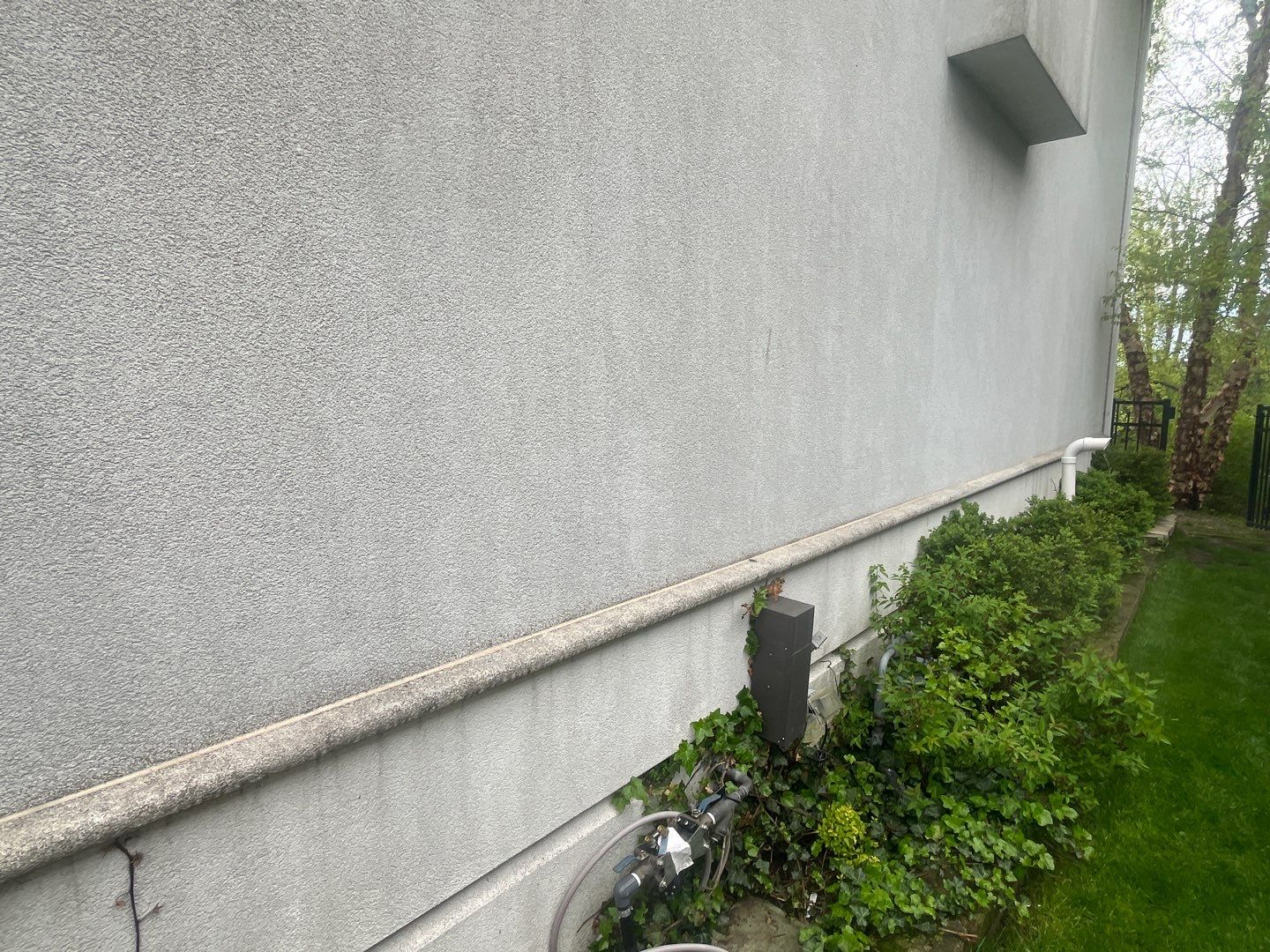 dryvit using Algaecide, soft wash soap by Northern Power Washing LLC.