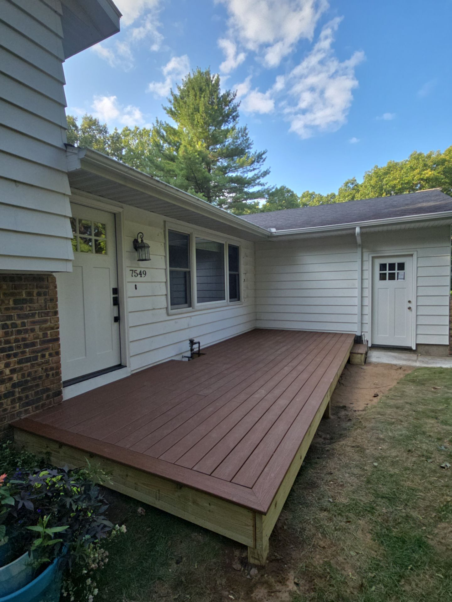 Exterior Remodel & Custom Deck by Cutting Edge Homes