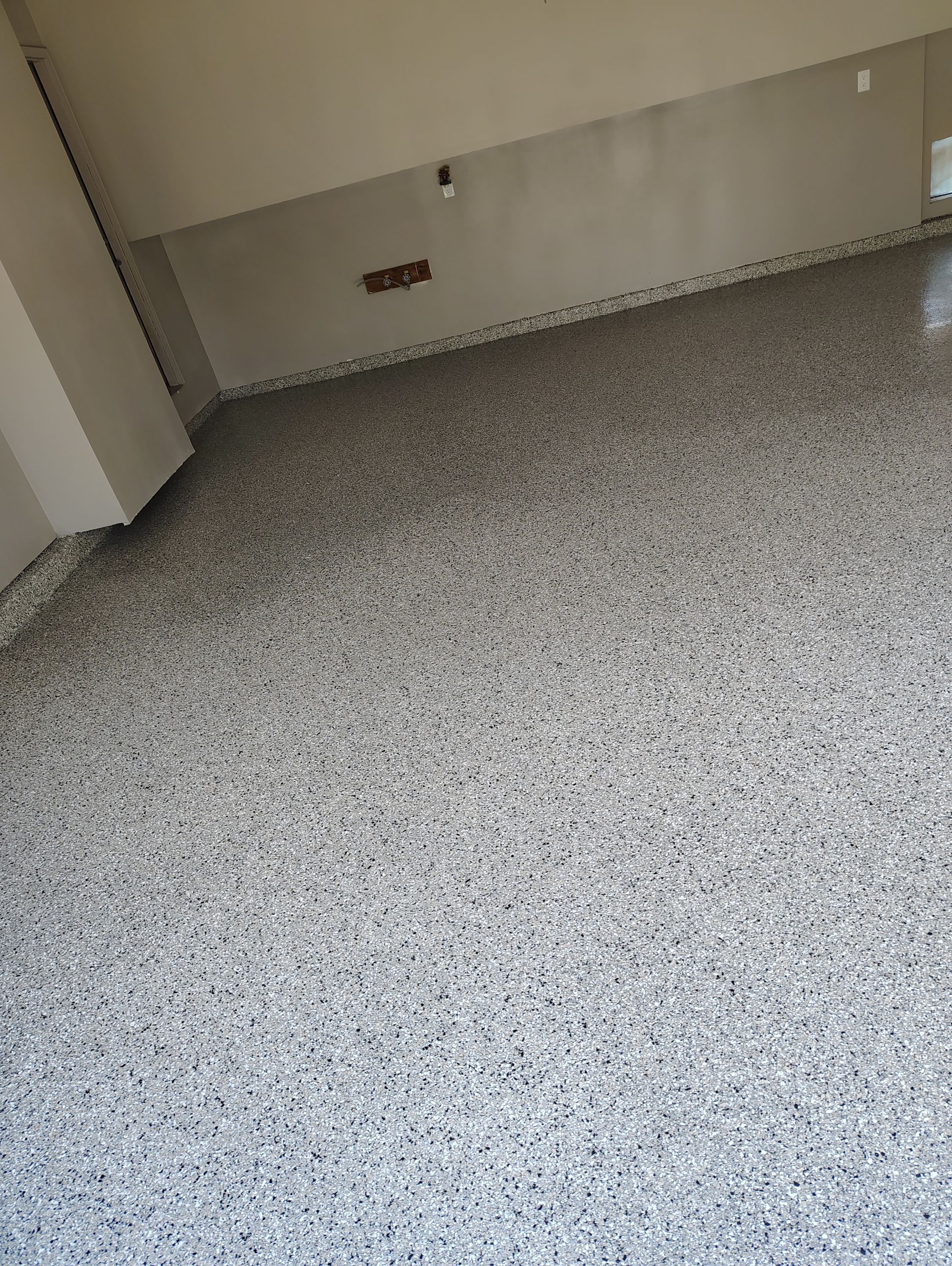 Garage Floor Coating with Decorative Flakes in Tea by Select Painting, Coatings & Garage Cabinets