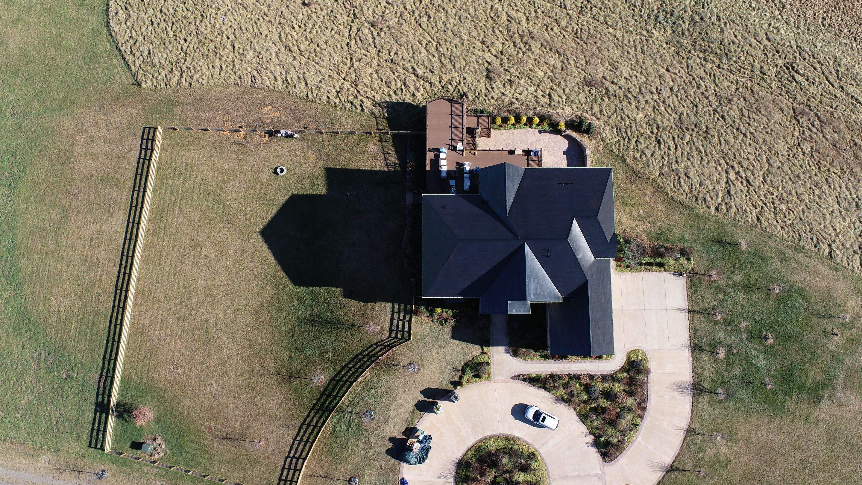 Tesla Solar Roof Replacement by American Home Contractors