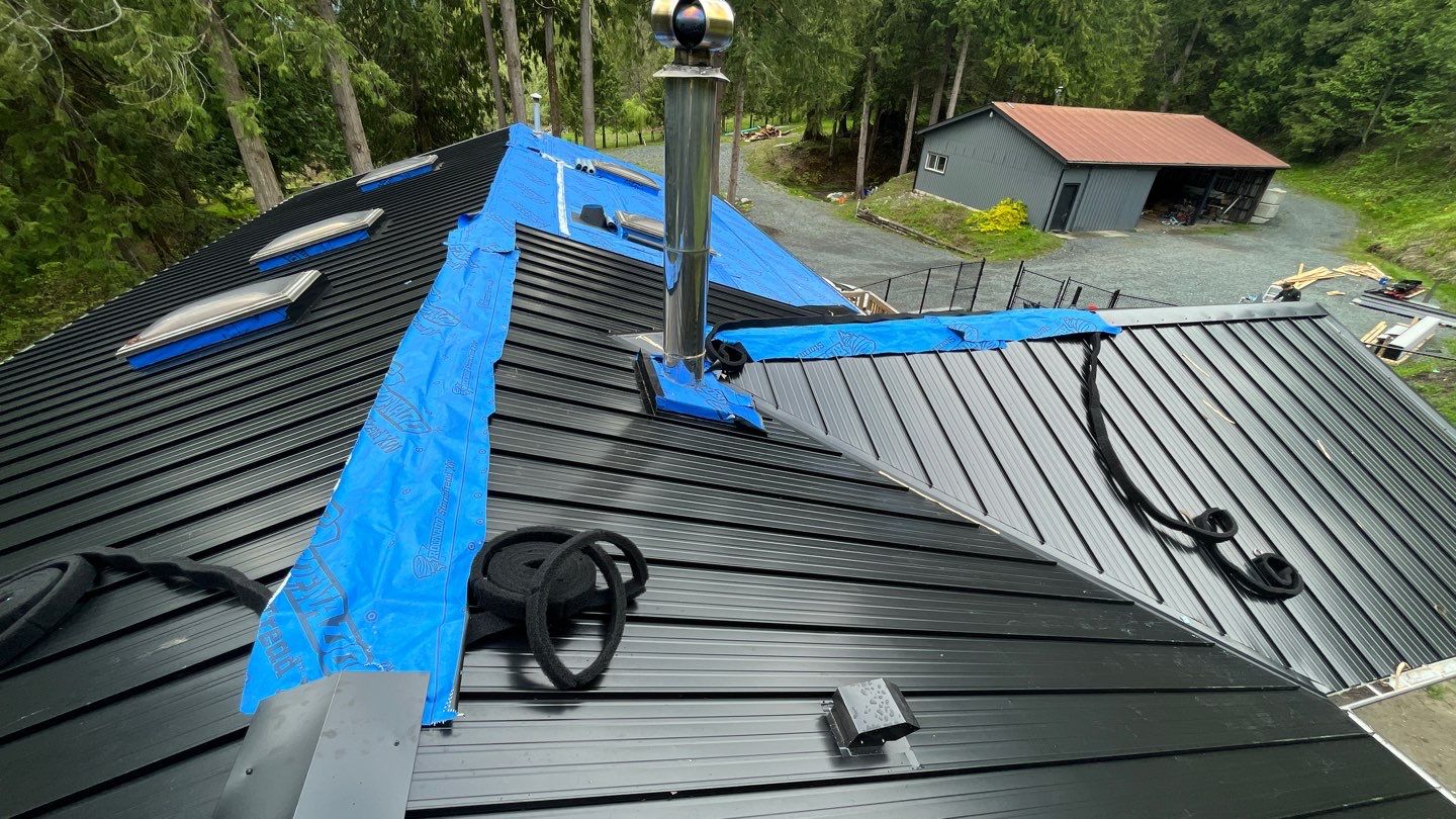 Residential ReRoofing Installation using 12" Prolok metal by Top Notch Roofing Inc