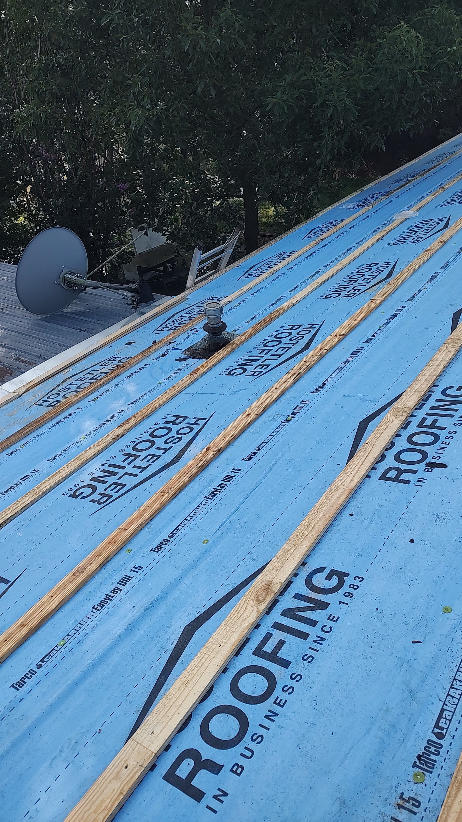 Residential Metal Roof Replacement using Reed's Metals by Hostetler Roofing