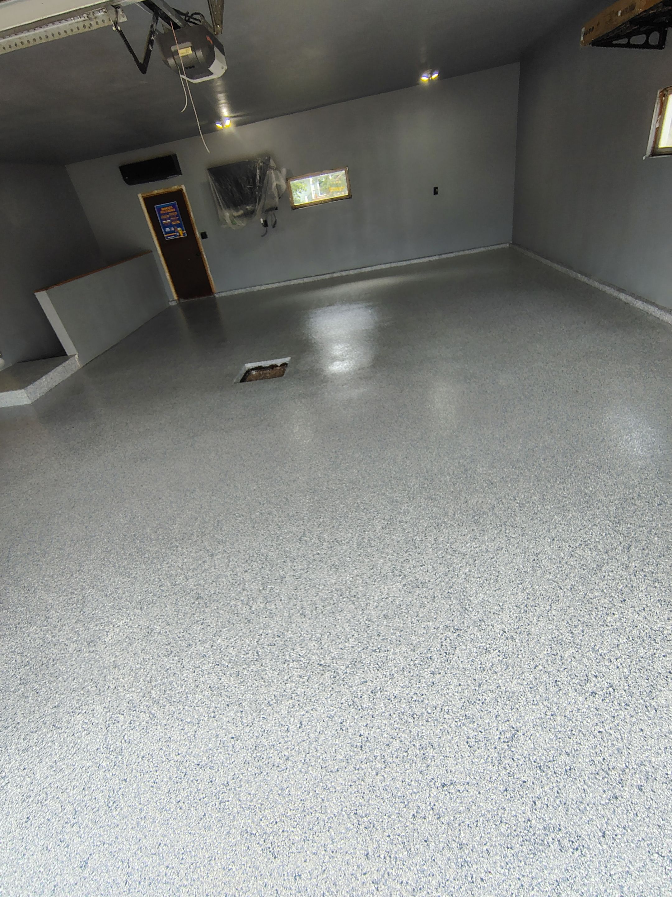 Garage Floor Concrete Coating and Surface Restoration in Colman by Select Painting, Coatings & Garage Cabinets