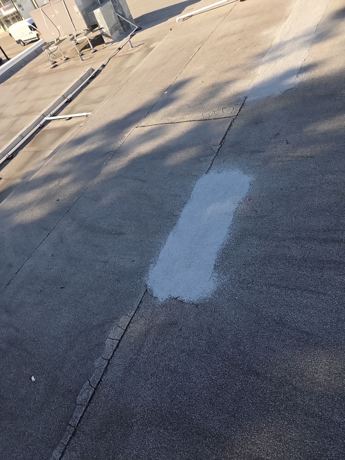 Commercial Flat Roof Restoration Using Silicone Coating in Hallandale Beach by Aastro Roofing