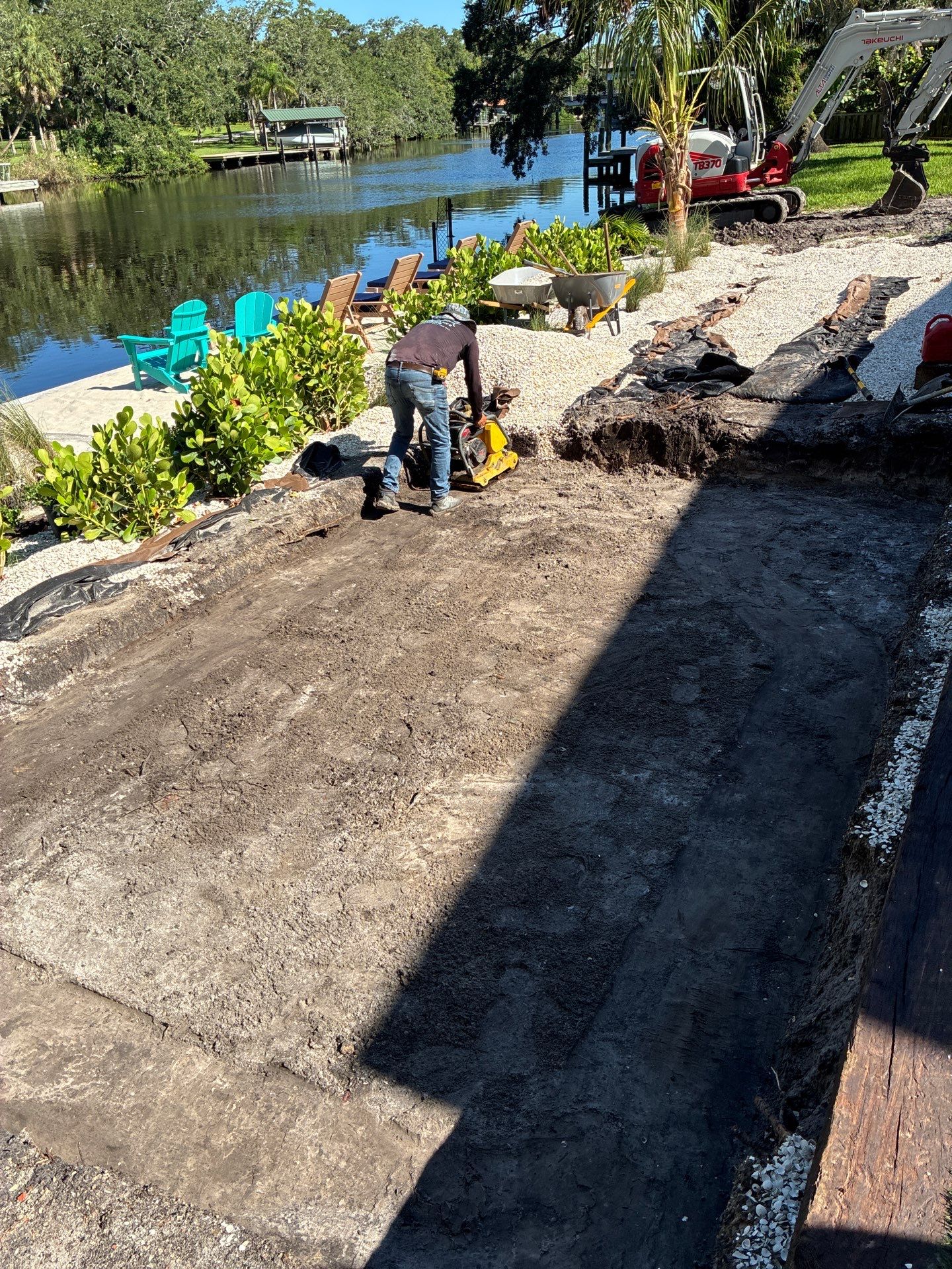 Grading back yard oasis by Level One Grading