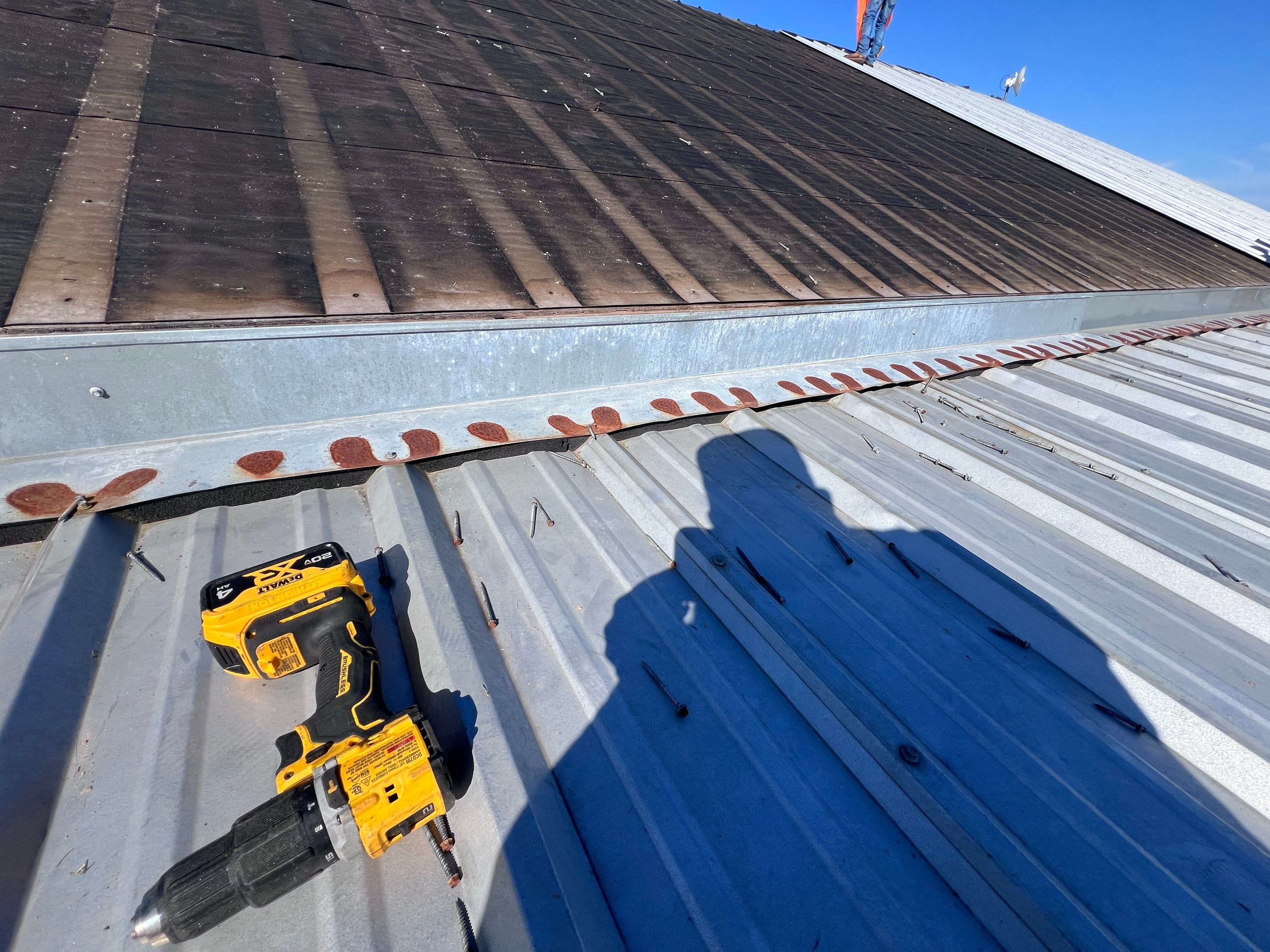 Residential Roofing Installation using Metal by Roof Repair Company
