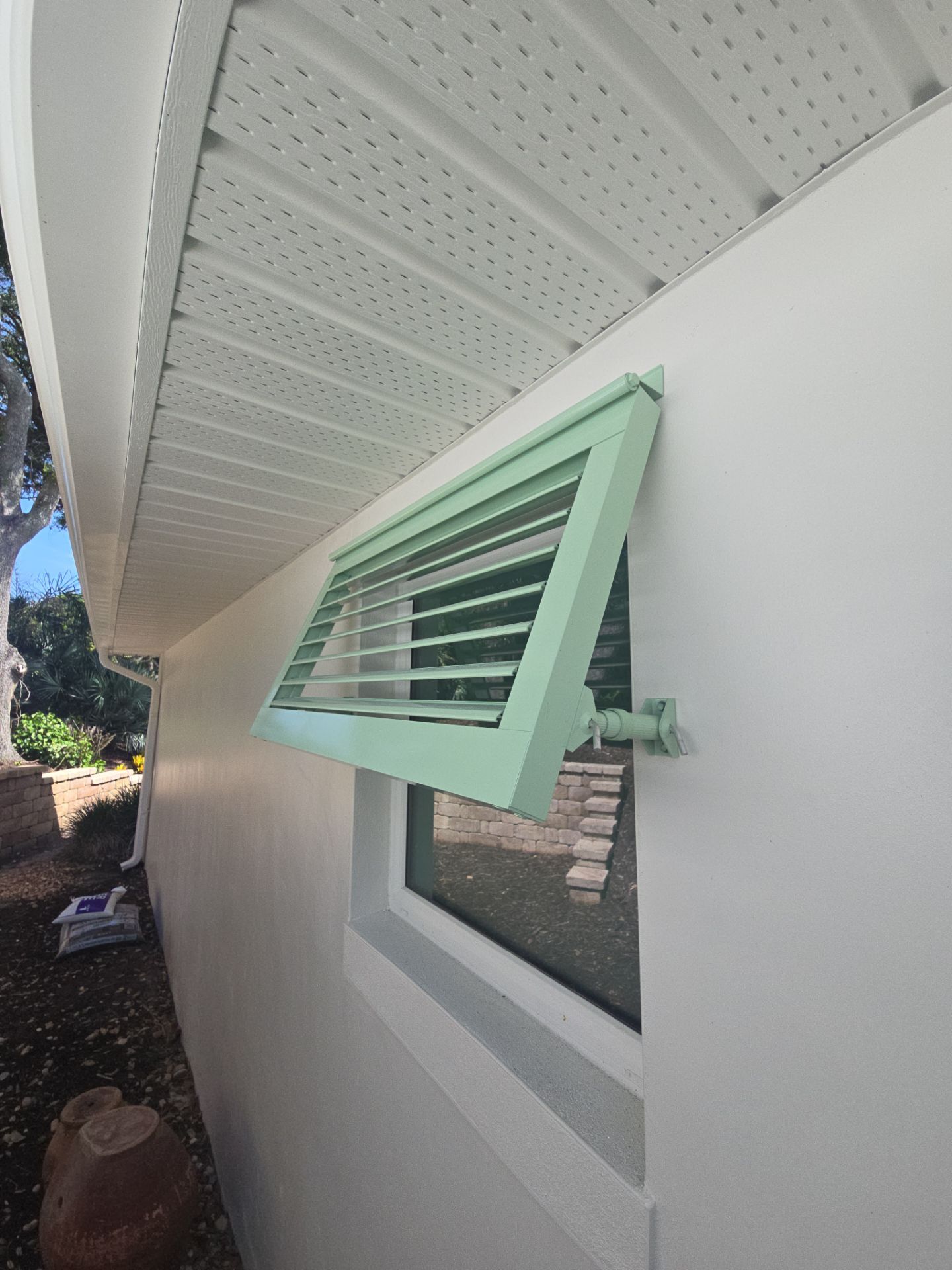 Deco Bahama Shutters RAL 6019 PASTEL GREEN by Smart Guard Shutters