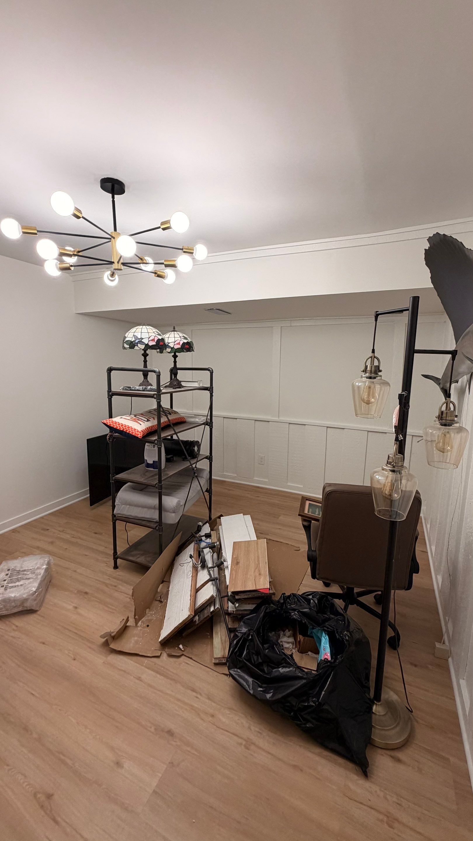 Basement Remodeling with Wood-Look Flooring and Custom Wainscoting in Dunwoody by Swift Home Renovations