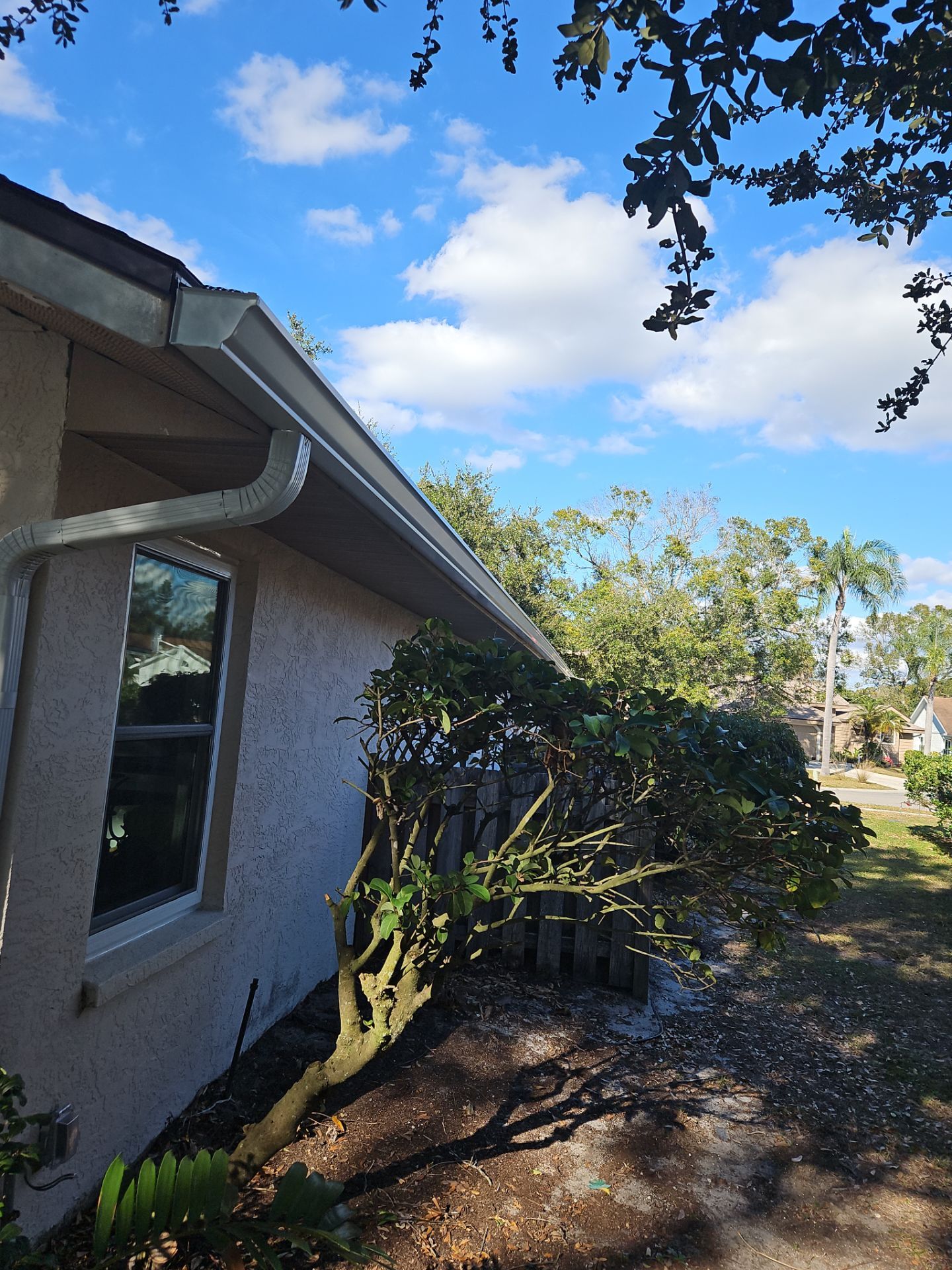 Seamless Aluminum Gutter Installation using 6 Inch Seamless Gutters in Sarasota FL by Gutter Professors