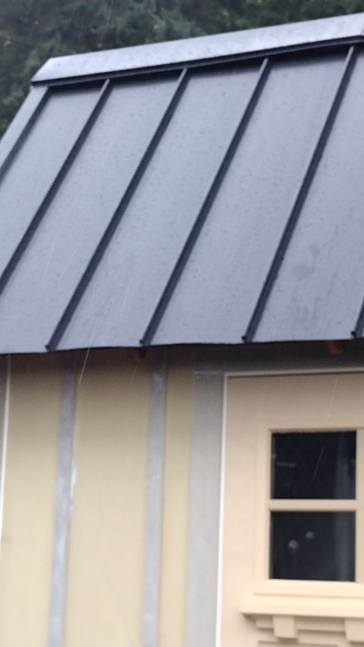 Residential Metal Roof Installation using Taylor Metal Snap Lock Metal Color: Black by Orezona Building & Roofing Company, Inc.