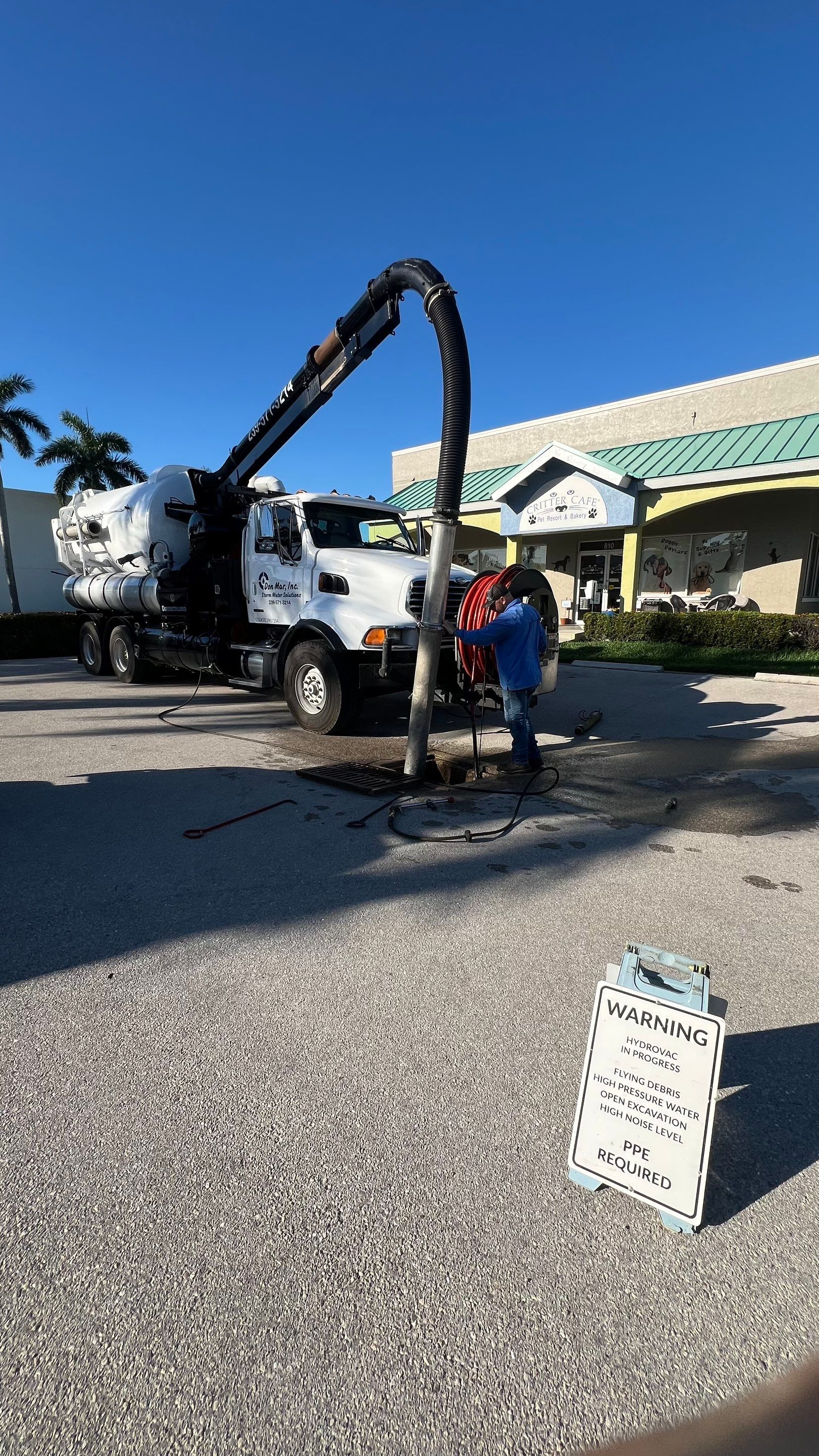Stromwater System Maintenance at Bill Smith Appliances / Critter Cafe Marco Island Catch Basin by Don Mar, Inc. Storm Water Solutions