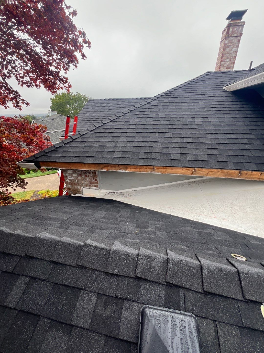 Residential Roofing Installation using IKO Dynasty (Color: Granite Black) by Orezona Building & Roofing Company, Inc.
