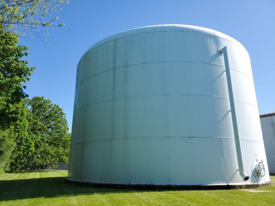 Water tank cleaning by Northern Power Washing LLC.