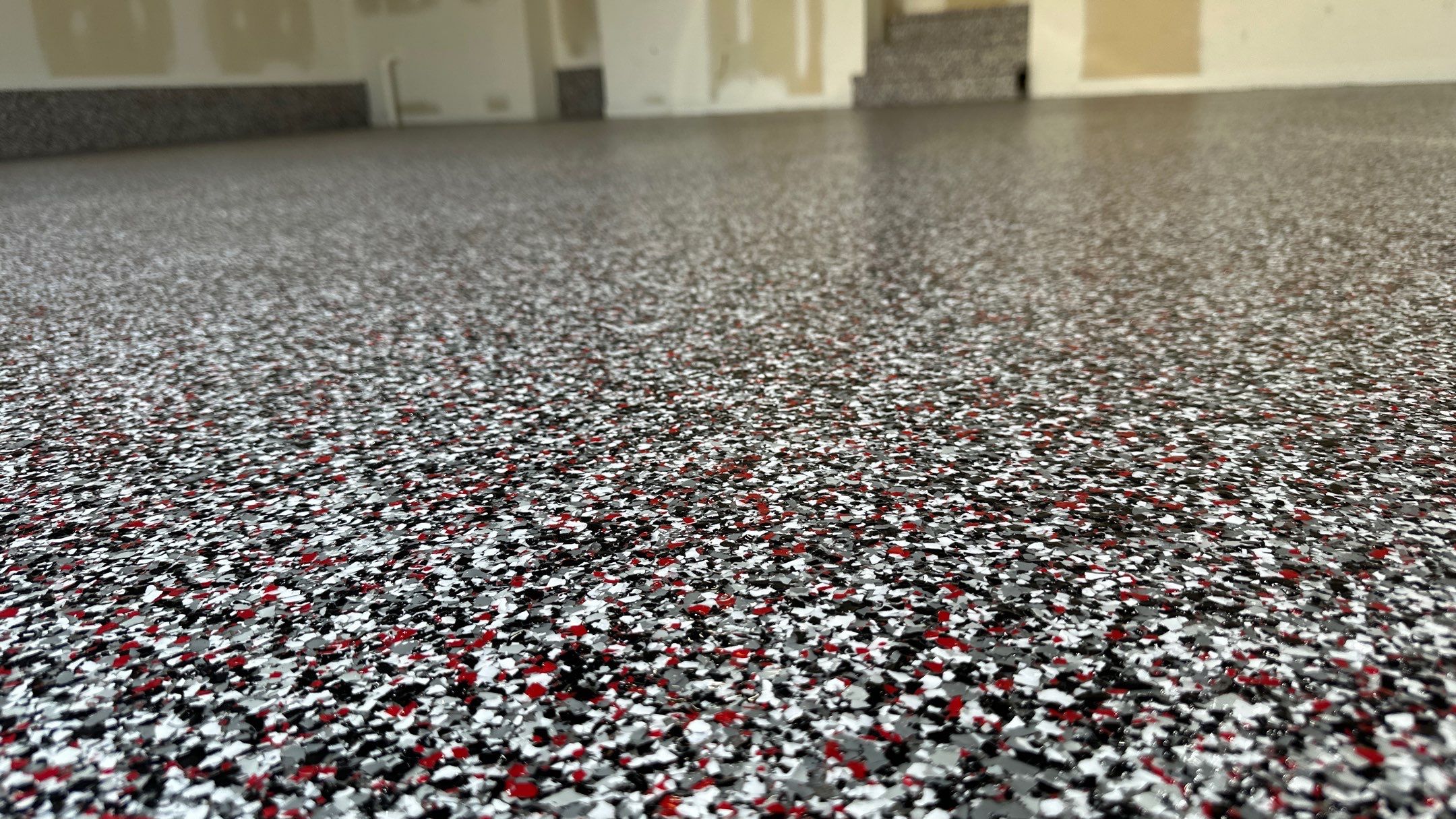 Amber Y. had a new Banner Red floor installed  by Banner Garage