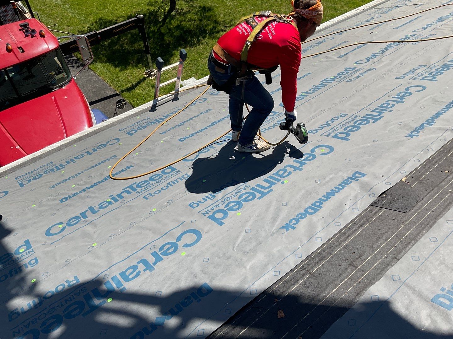 Residential Roofing Installation using Landmark Shingles Color Weatherwood by Alpha Design Services
