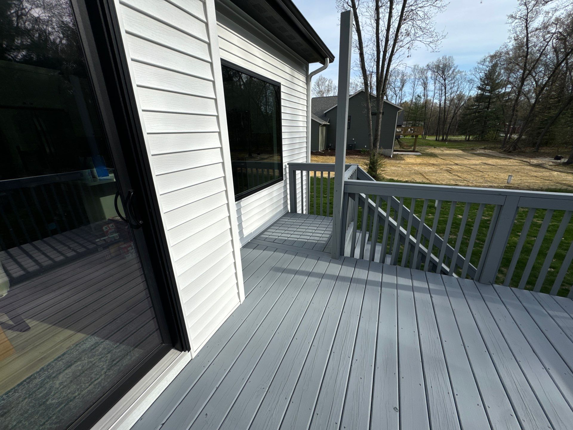 Deck Staining, Repairs & Sunshade Installation by Gordon Painting