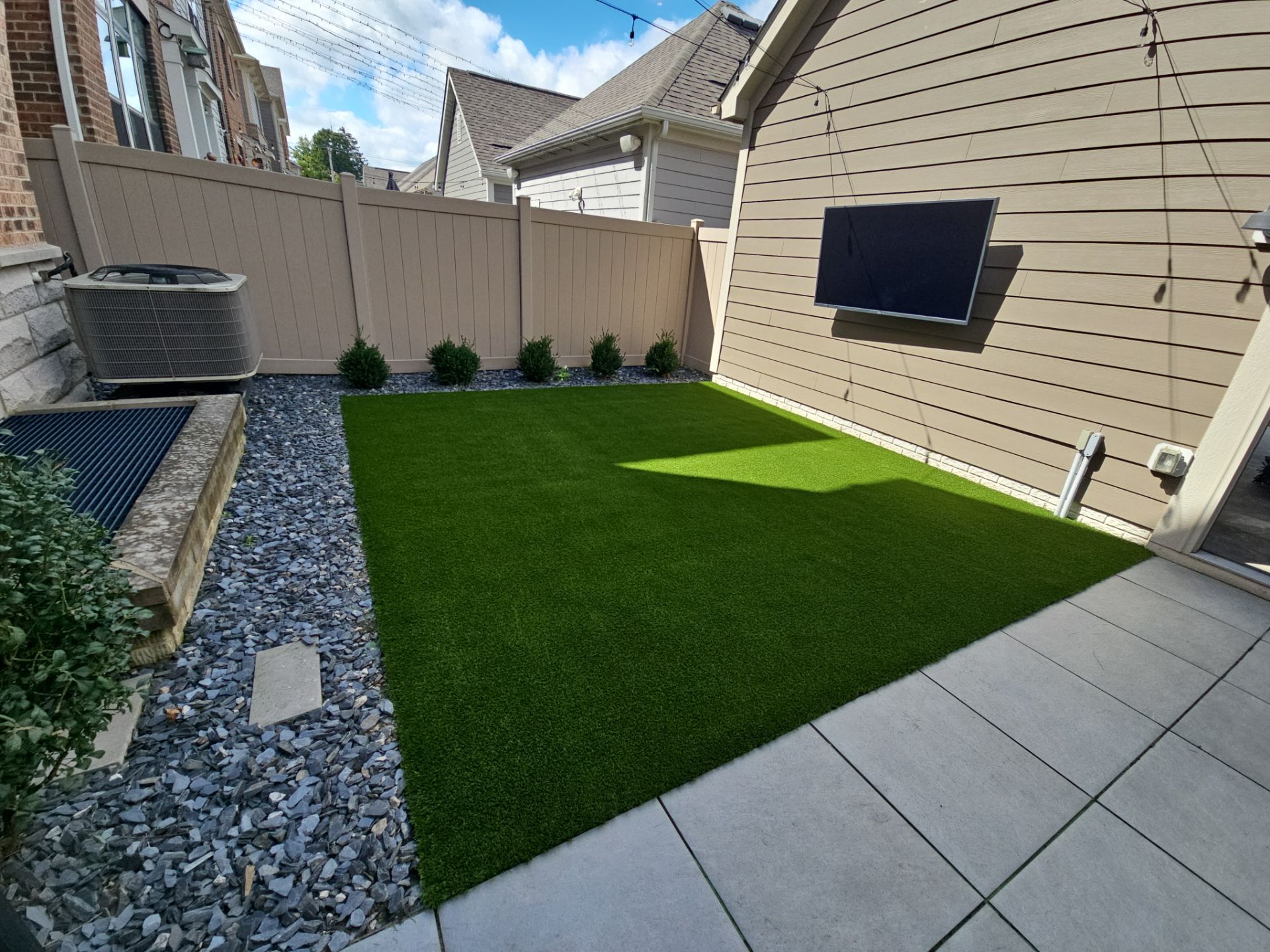 Backyard Paver to Turf Renovation by Southwest Greens Midwest