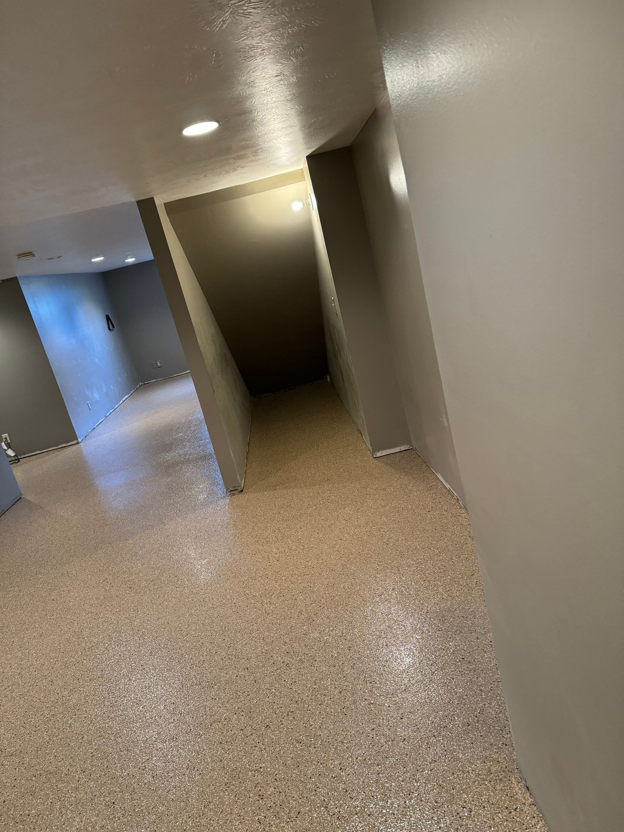 Custom Multi-Fleck Epoxy Floor Coating for Residential Basement by Select Painting, Coatings & Garage Cabinets