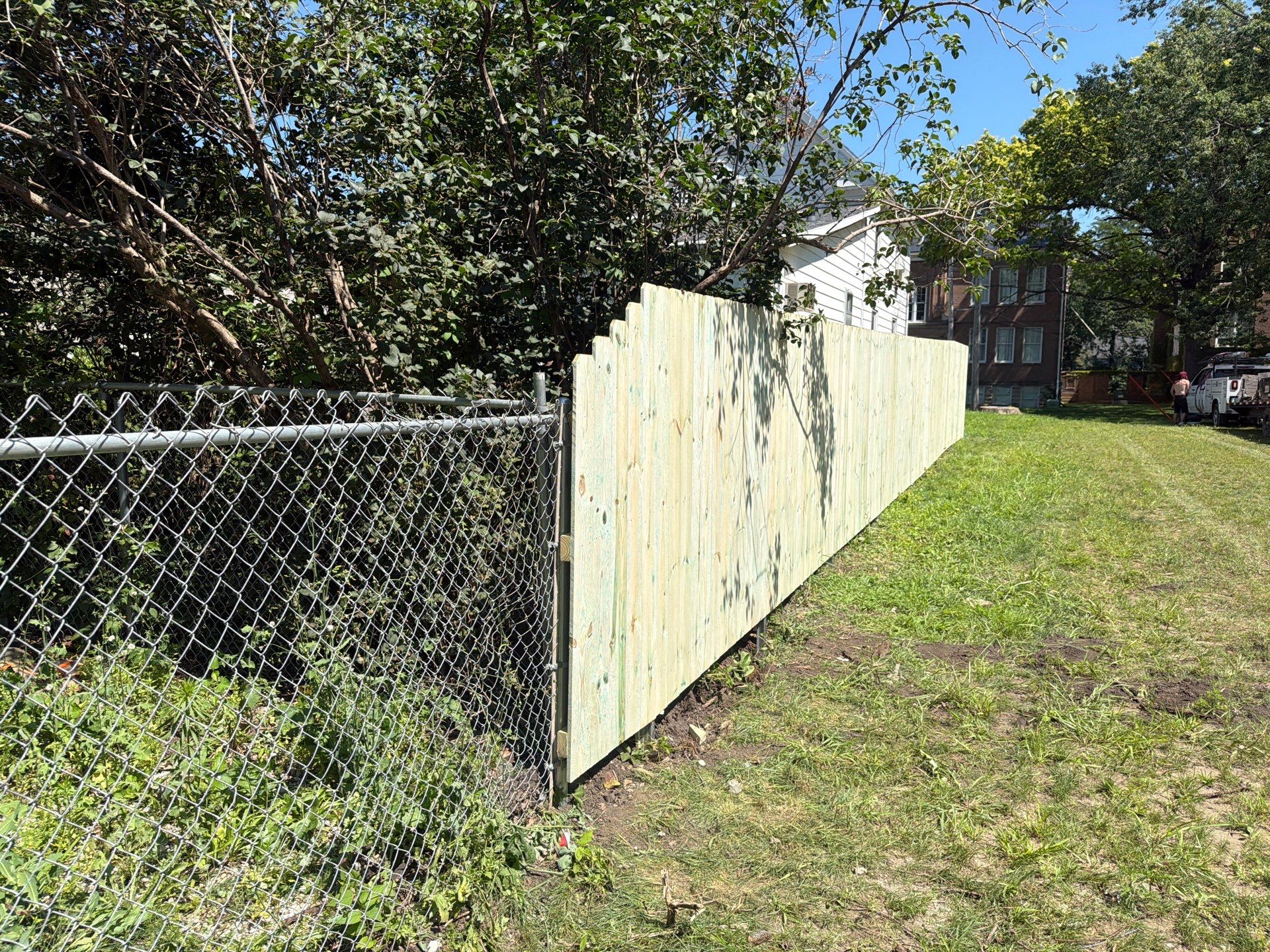 Pressure-Treated Wood Privacy Fence Installation in Waterloo by Perfect Picket Fence and Stain
