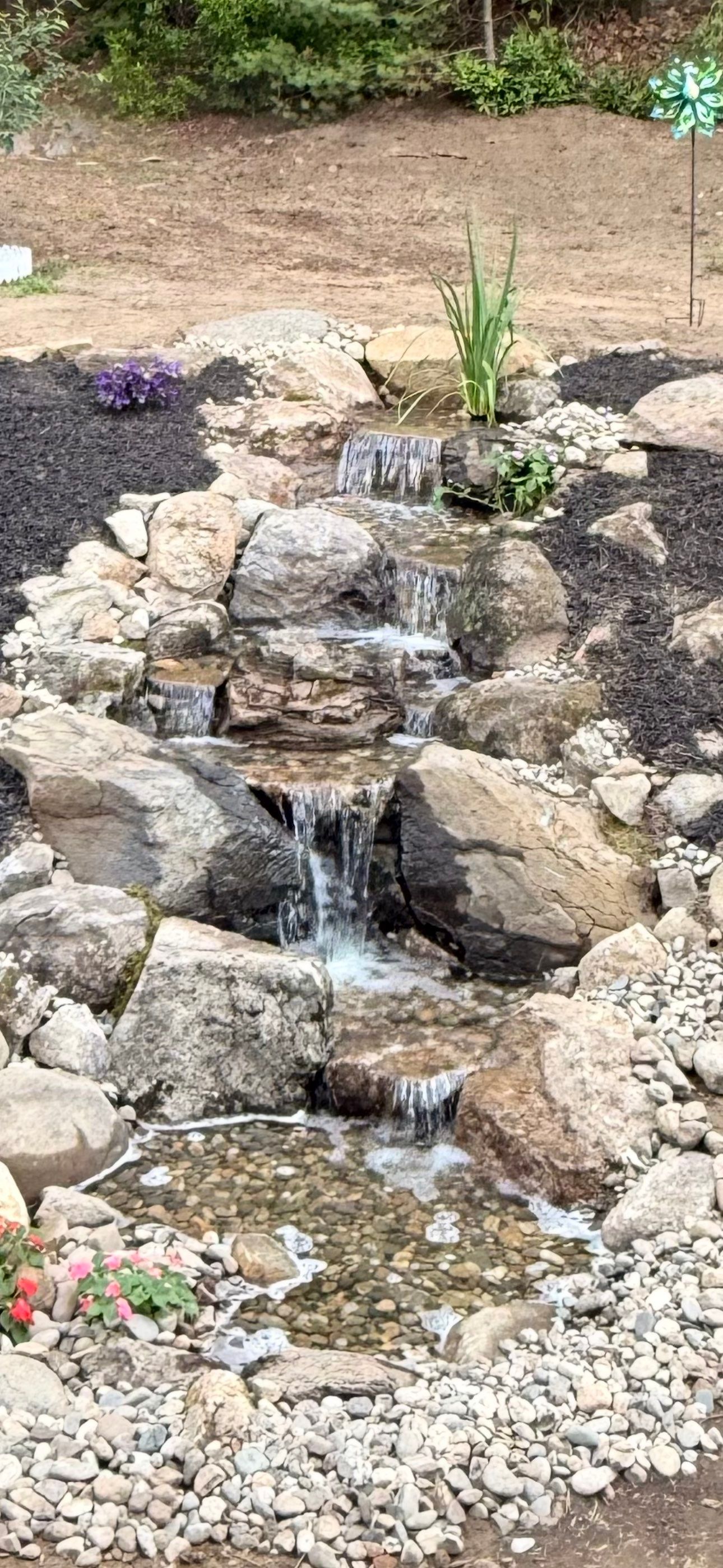 Complete Rebuild of a Pondless Waterfall in Palmer by Wicked Water Gardens