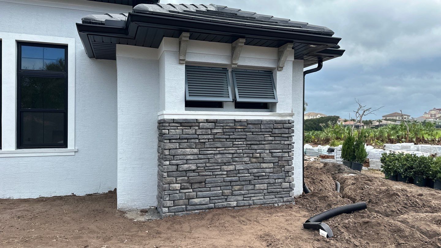 Bahama Shutters in Blue Grey by Smart Guard Shutters